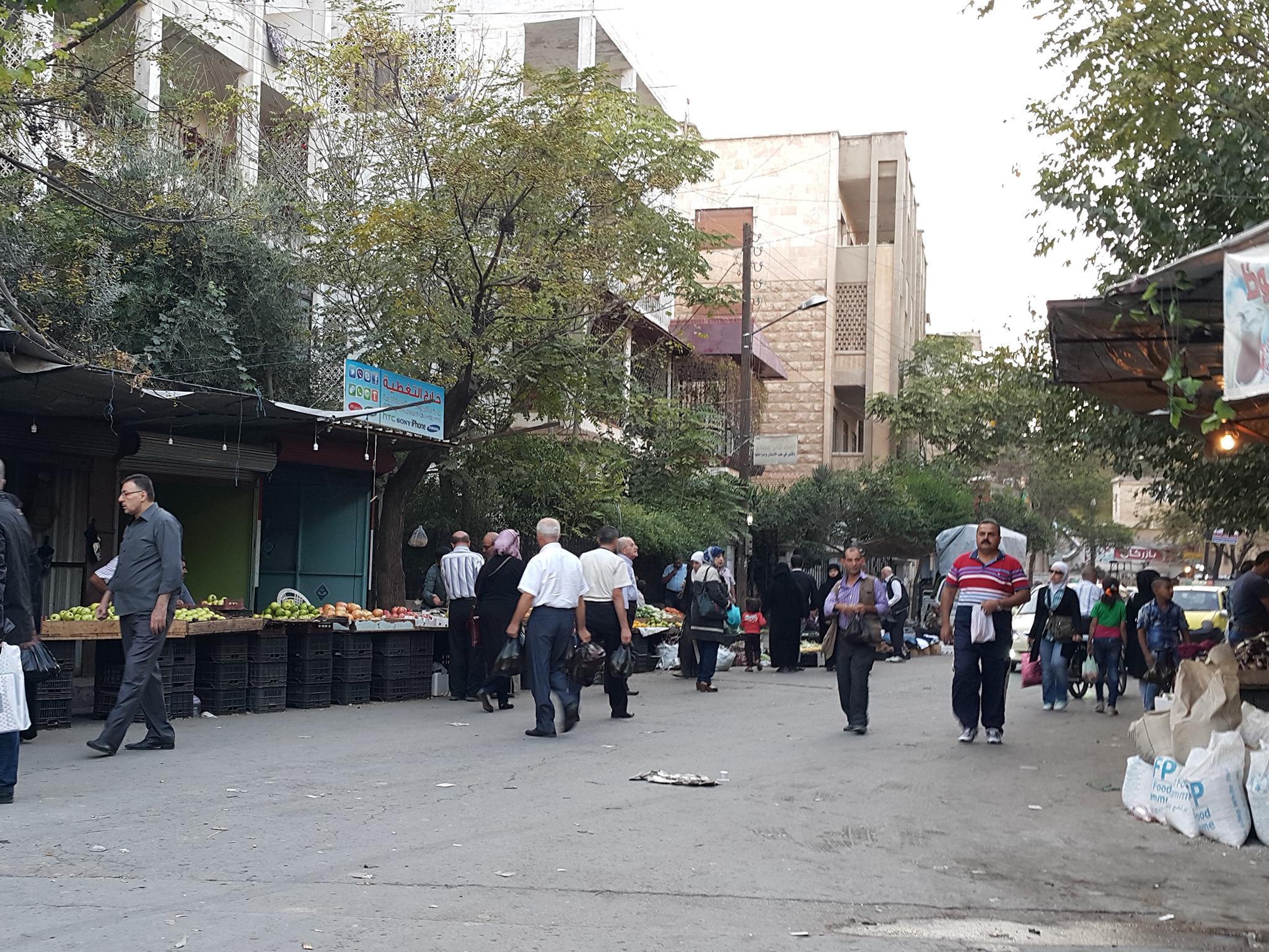 Aleppo, where the acacia are blooming in streets where wars are watched