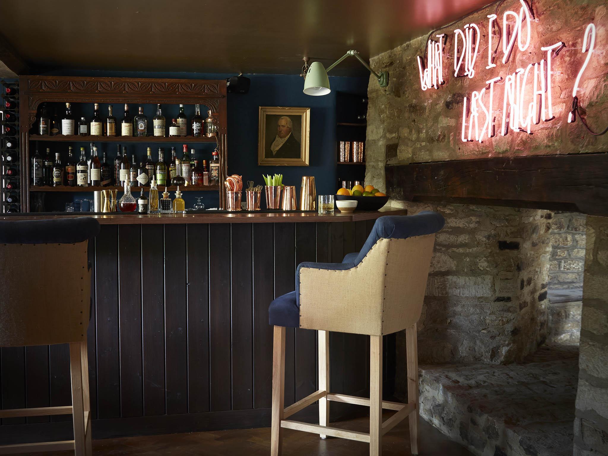 ‘What did I do last night?’: neon sign in the restaurant’s bar