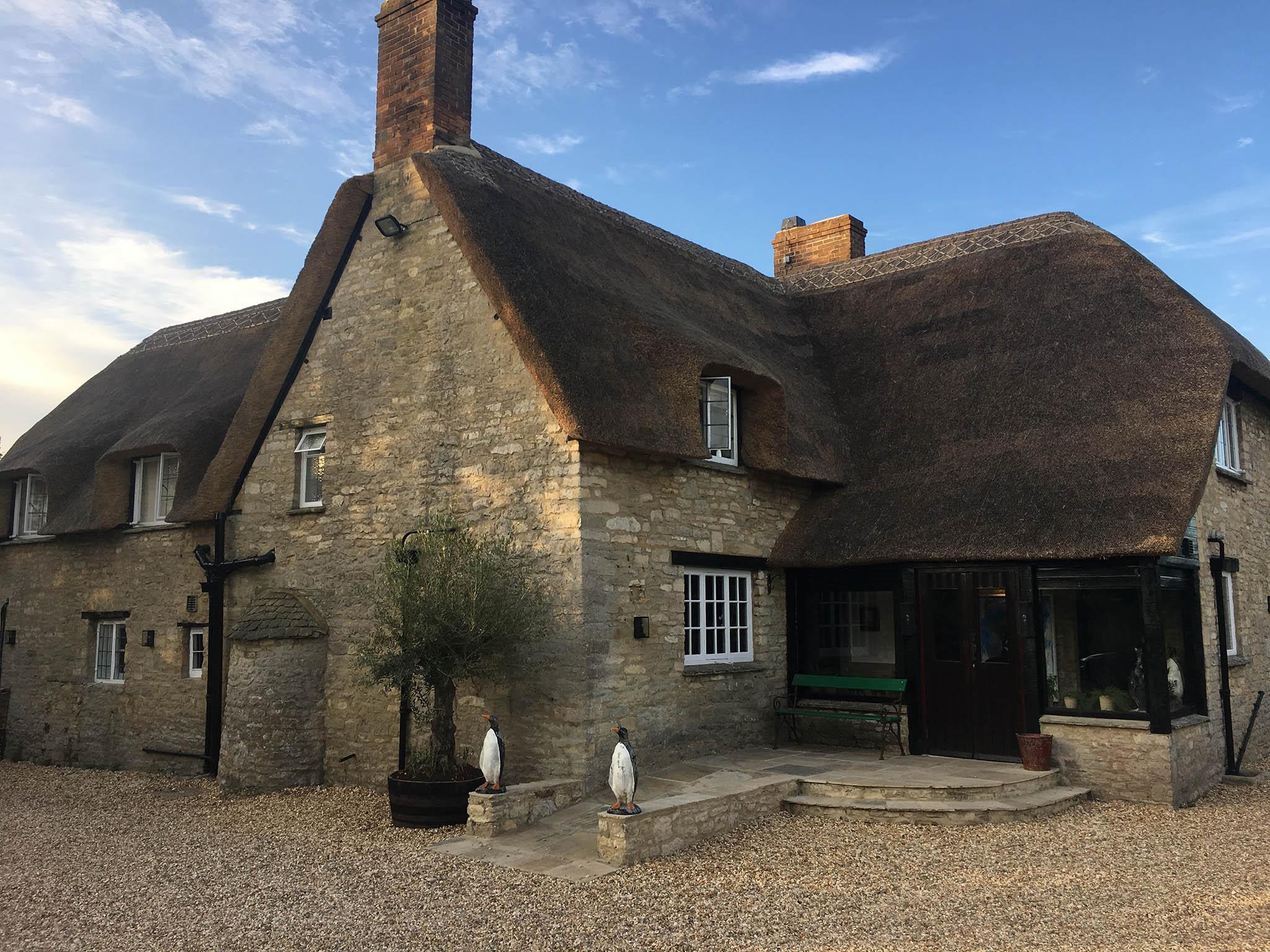 Penguins at the Oxfordshire pub’s entrance herald the eccentric delights awaiting inside