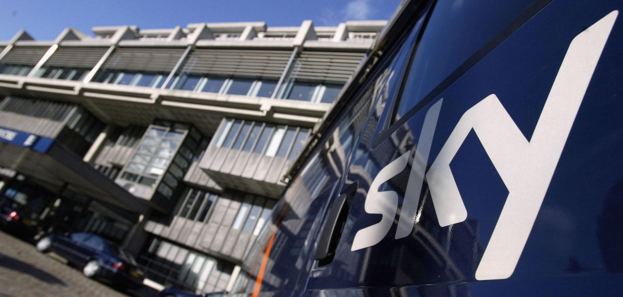 A Sky satellite van waits outside the Queen Elizabeth II Conference Centre while the British Sky Broadcasting Group's (BSkyB) Annual General Meeting (AGM) take place