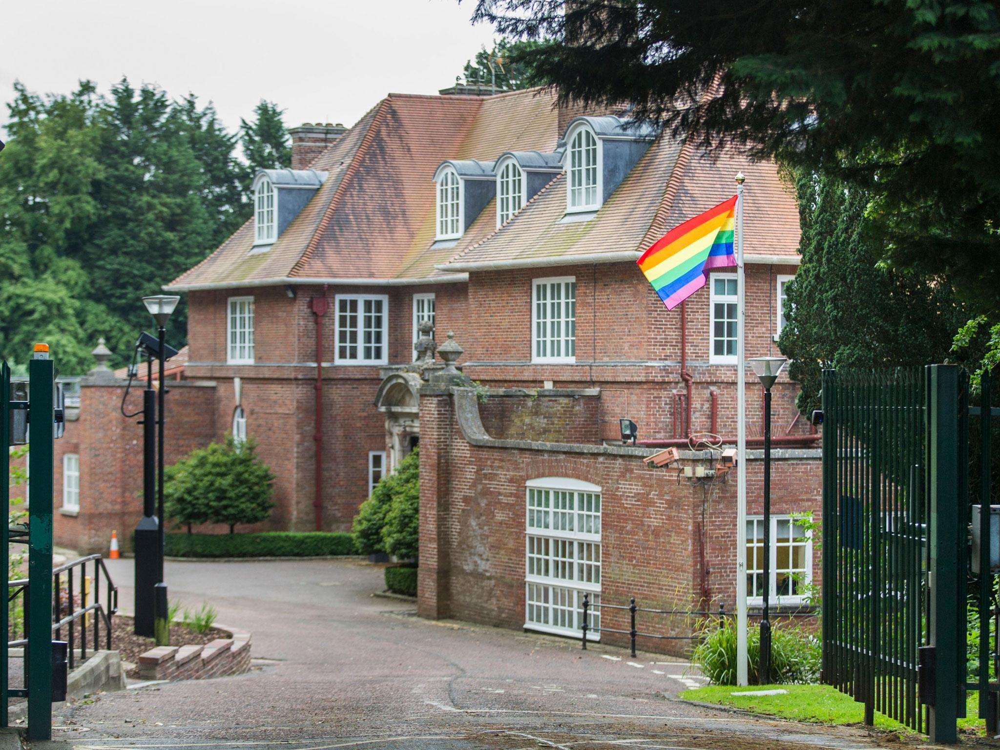 The flag-raising comes amid a long-running political dispute on the region’s ban on same-sex marriage