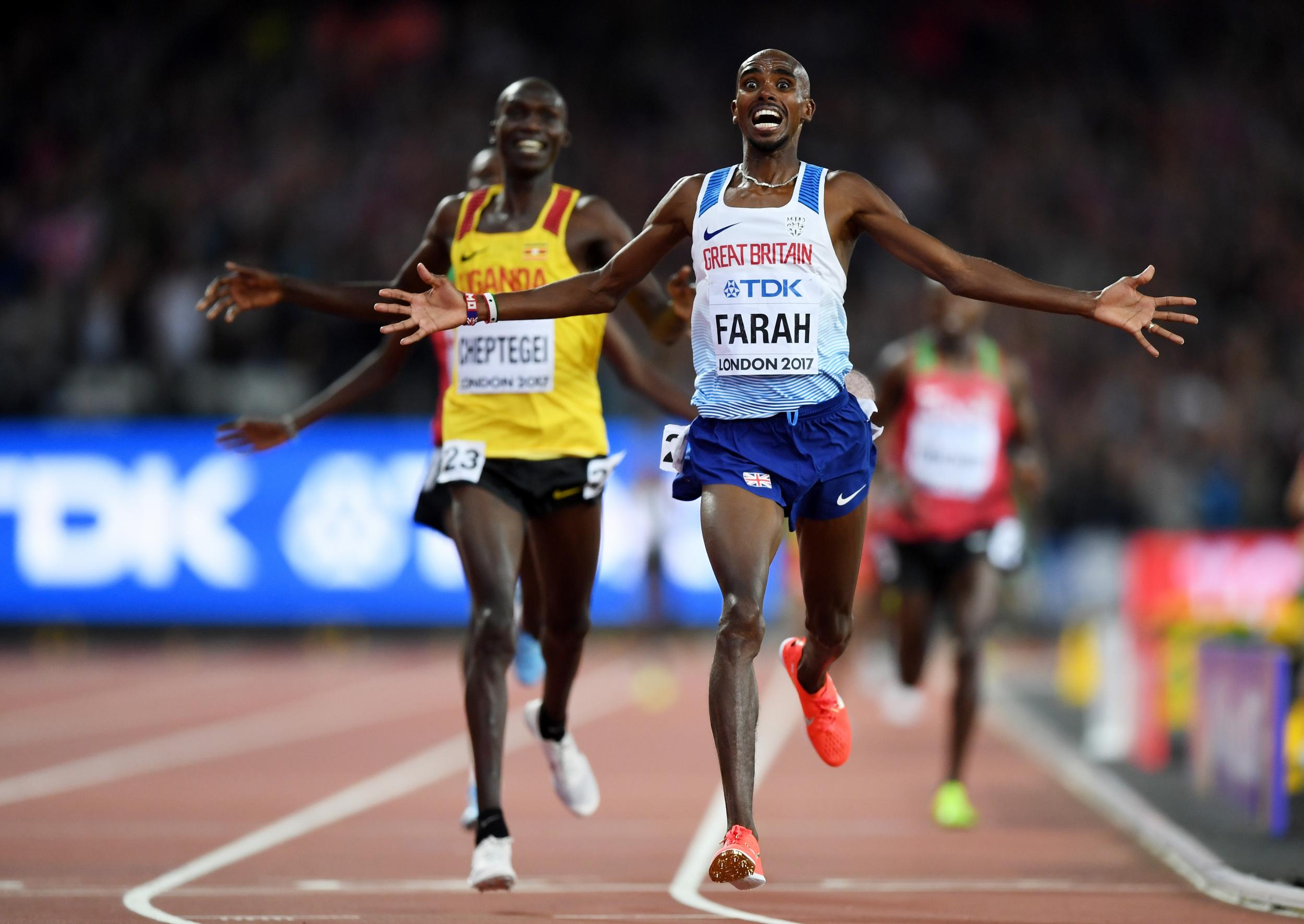 Mo Farah crosses the line at the London Stadium