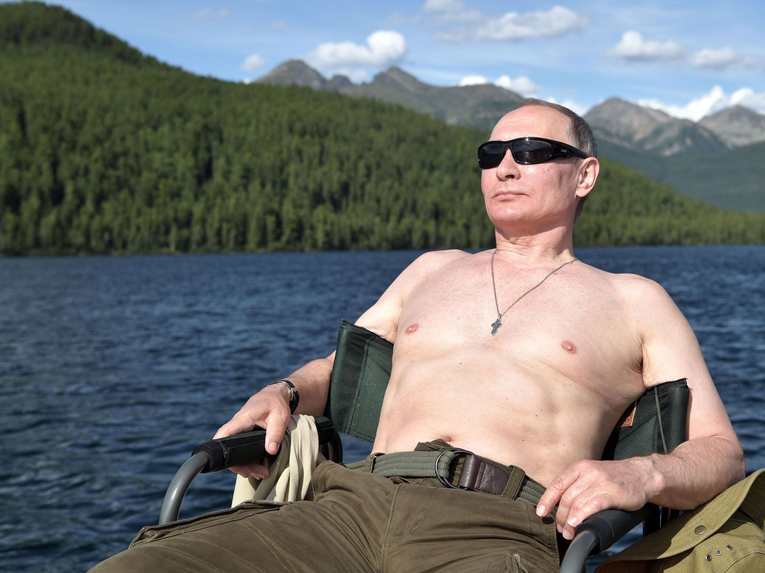 The former KGB agent turned ‘strongman’ president seems to like being photographed bare chested (Getty)