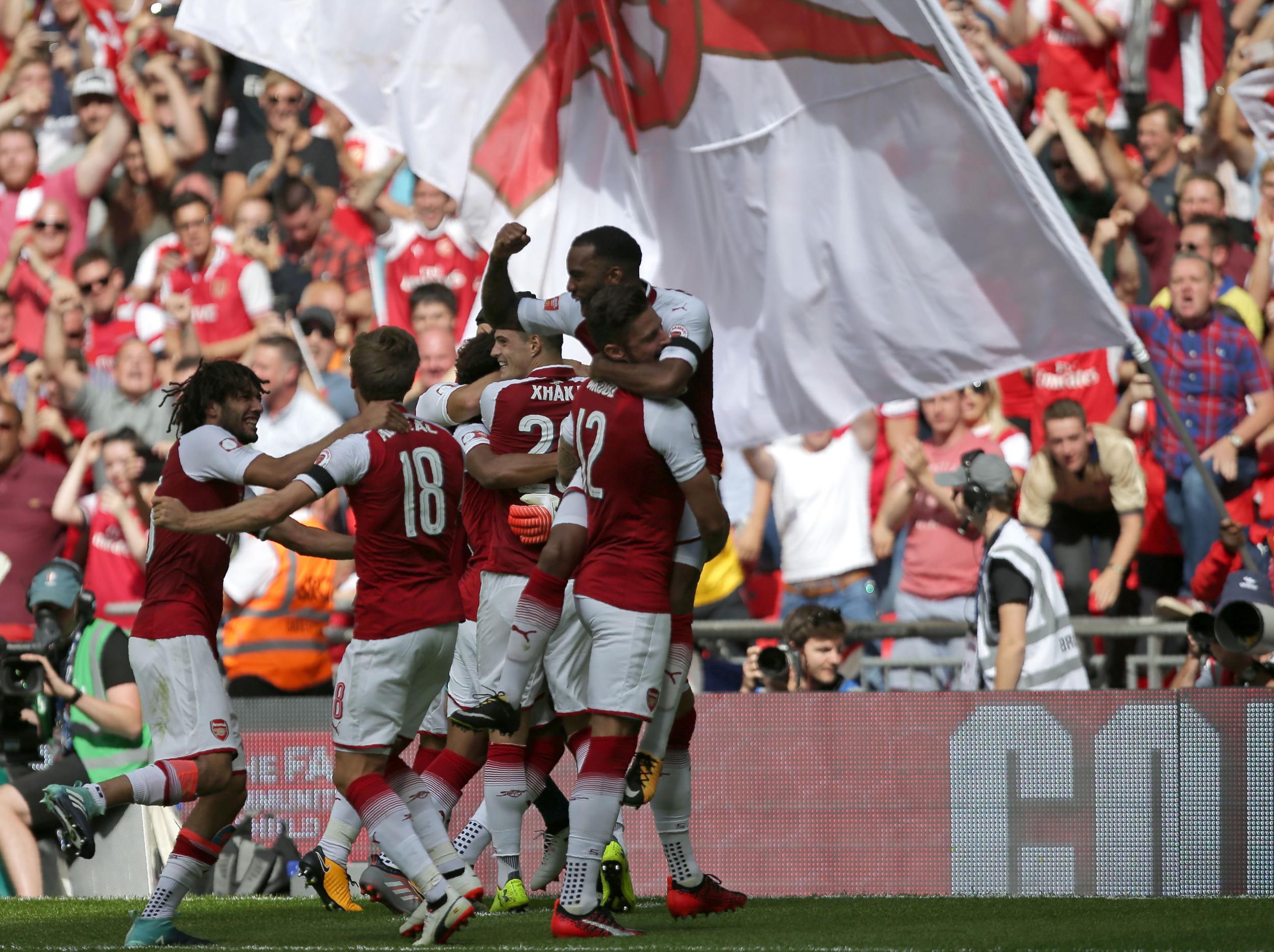 Arsenal celebrate their penalty shootout success