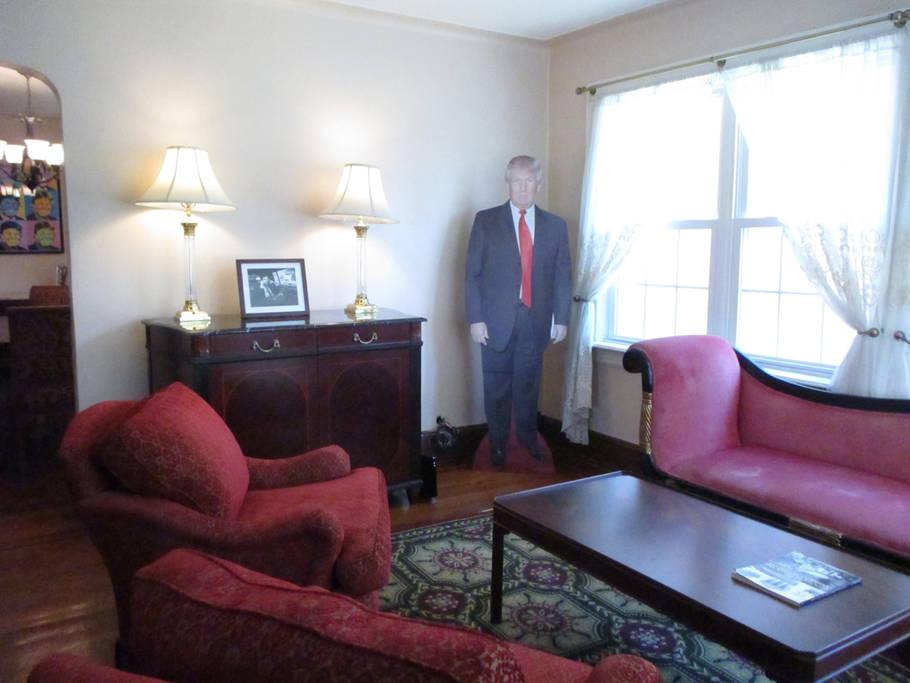 Mr Trump's childhood home has been renovated to include various memorabilia, including this cardboard cutout of the President