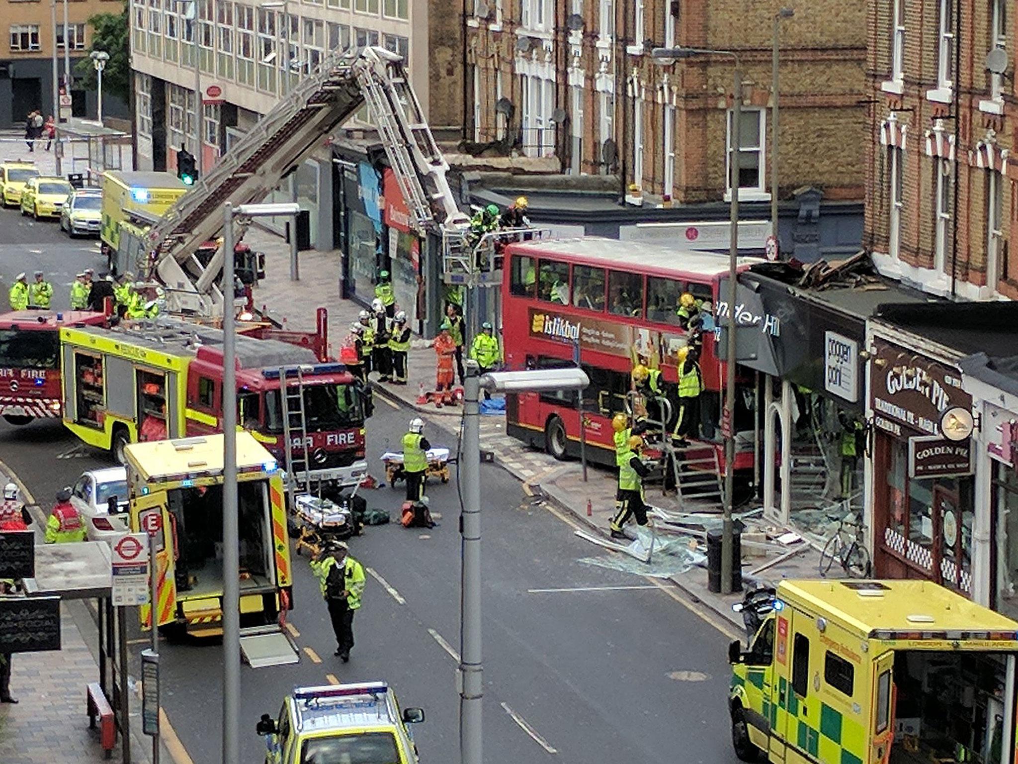 London Fire Brigade, London Ambulance Service and the Metropolitan Police at the scene of the crash in Lavender Hill, near Clapham Junction train station