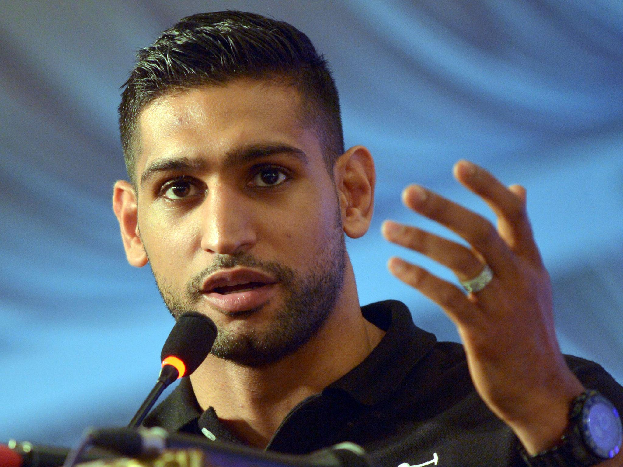 Amir Khan has revealed Anthony Joshua called him to clear things up