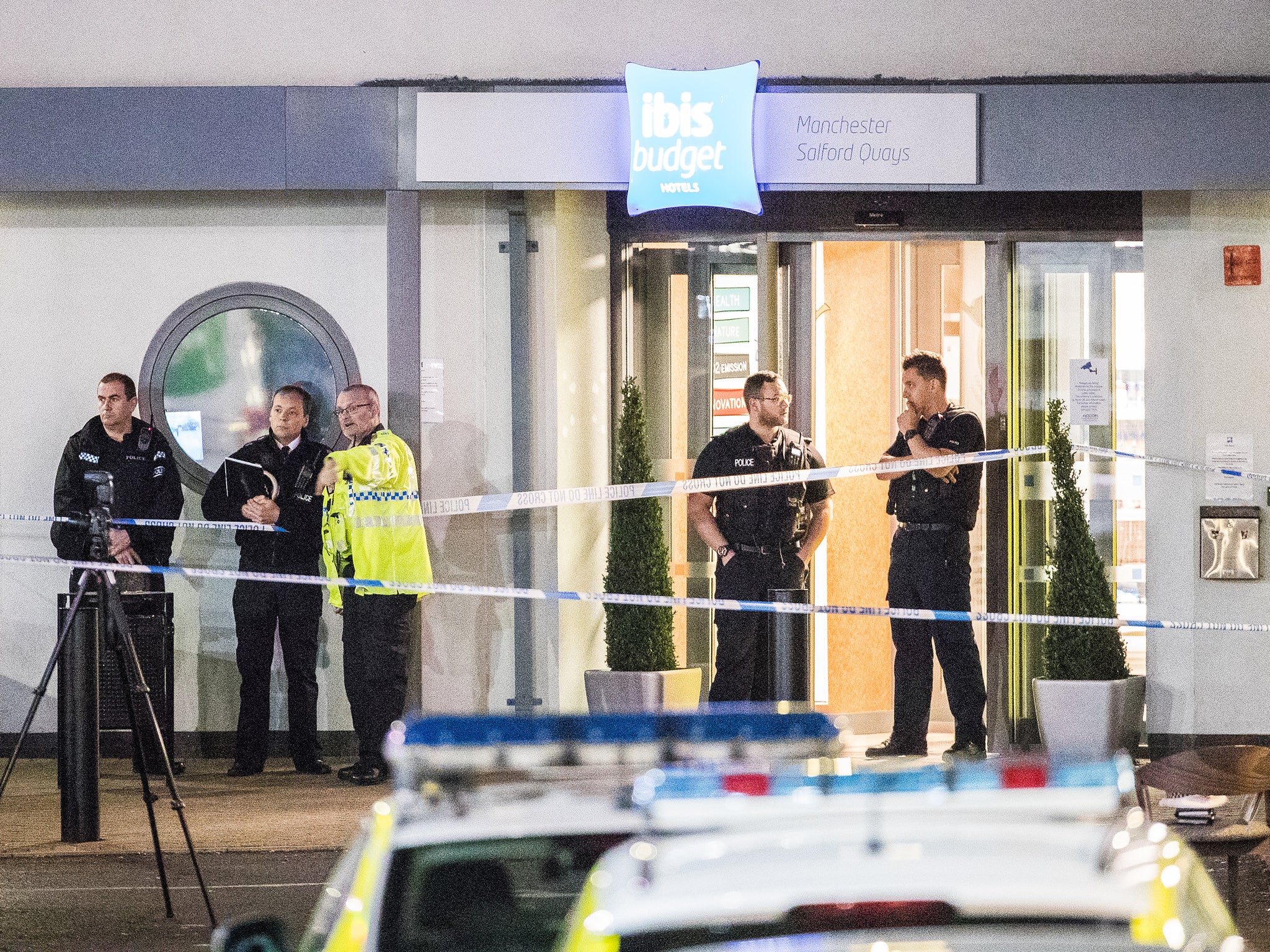 Police at the scene at the Ibis hotel in Salford Quays where a young boy was killed in a collision with a car