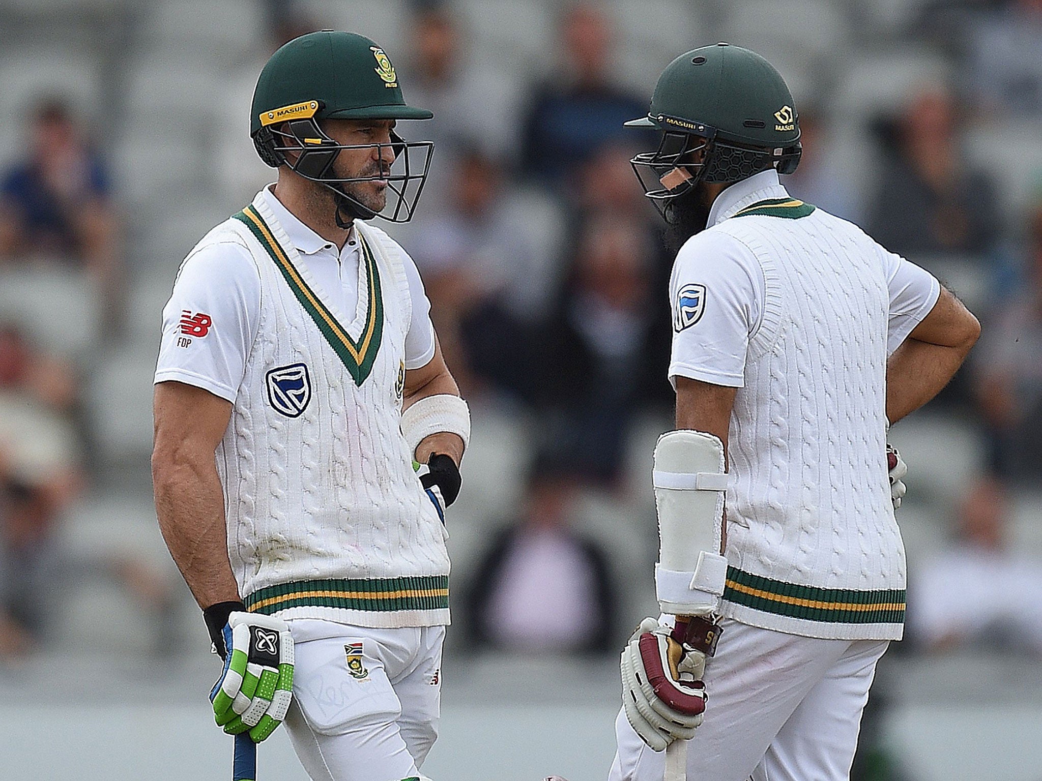 Faf du Plessis with team-mate Hashim Amla during the fourth Test