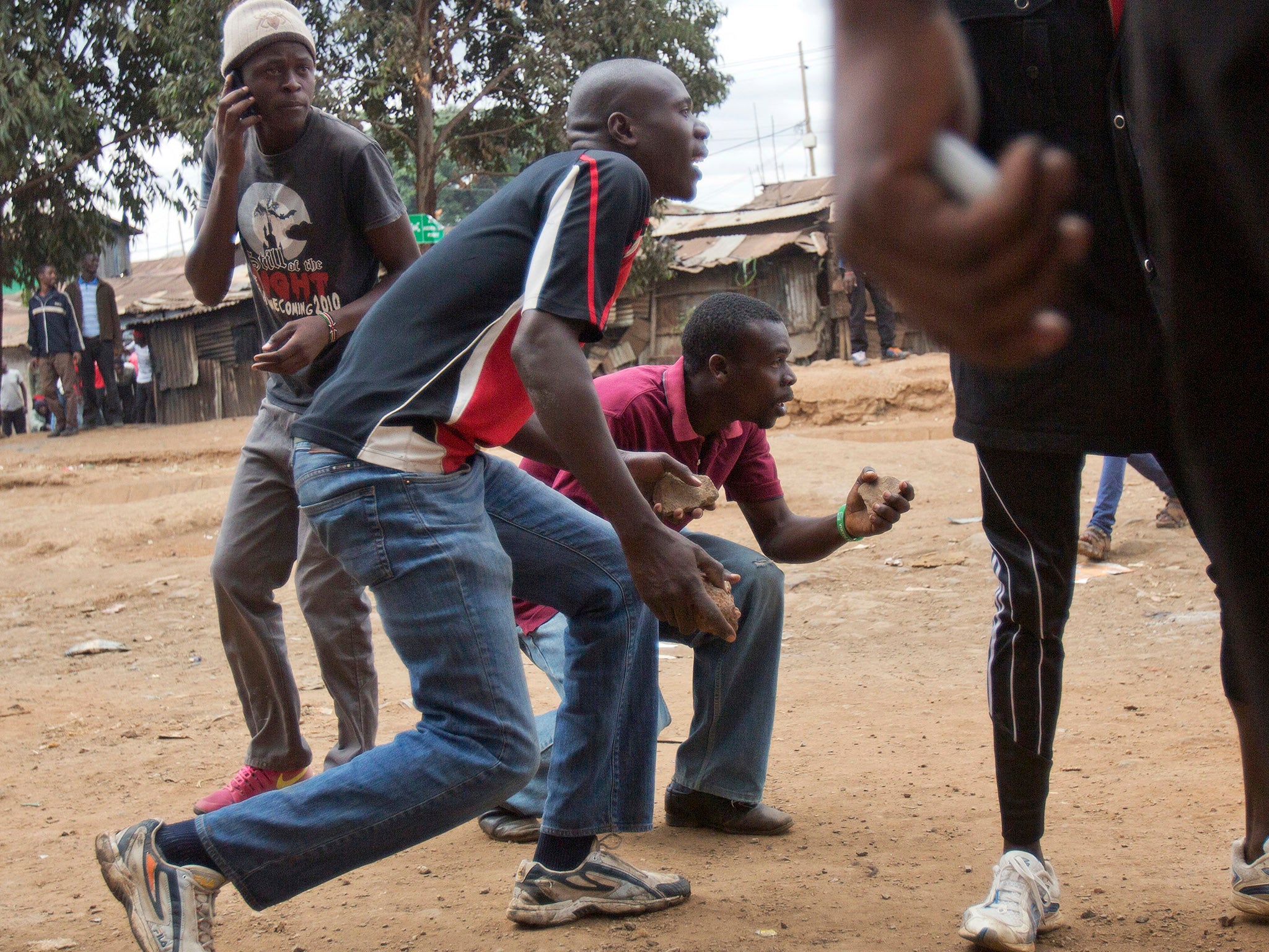 Supporters of opposition leader Raila Odinga engage security forces in Nairobi