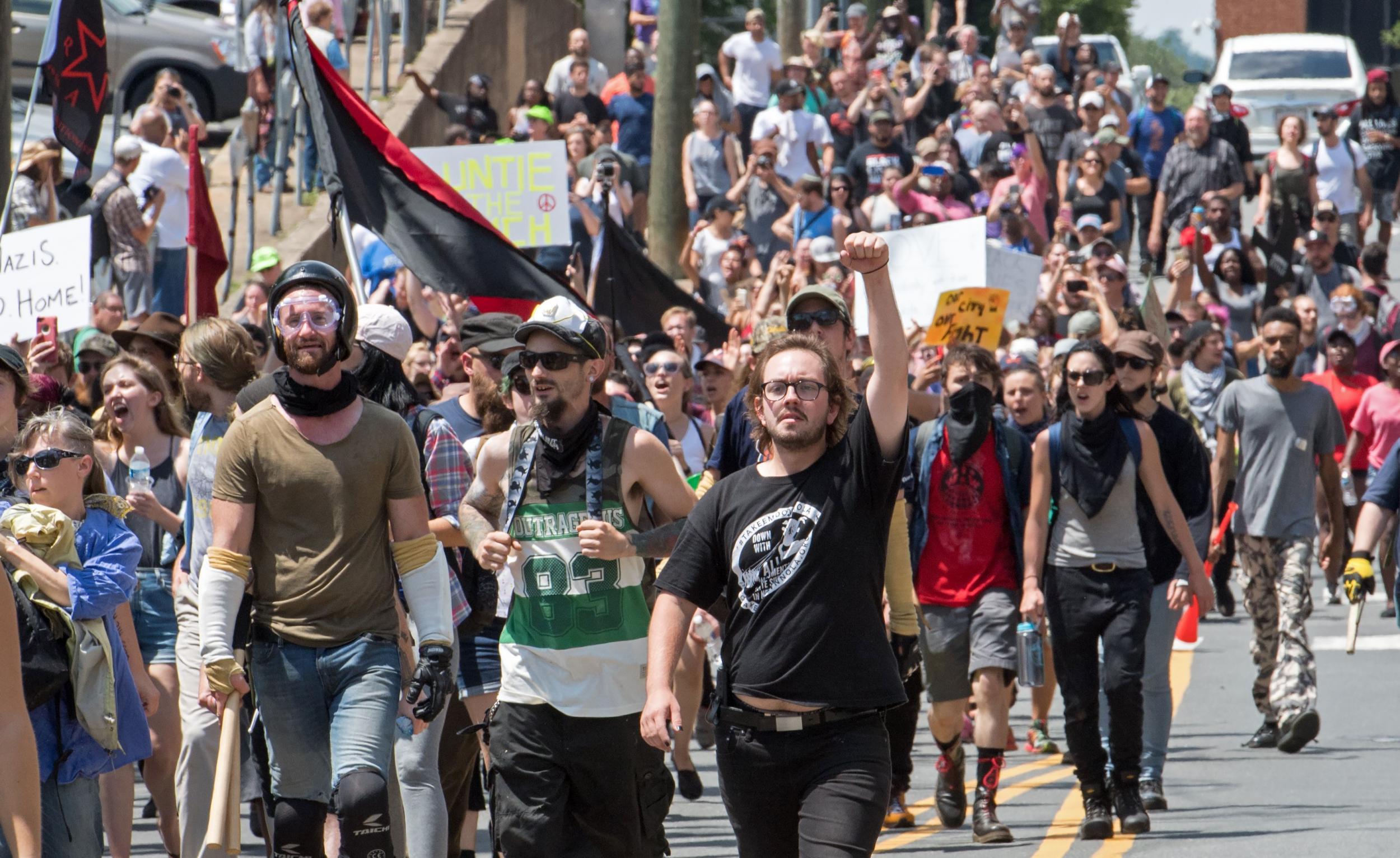 Pictured: Protesters marching in Charlottesville, Virginia on August 12, 2017