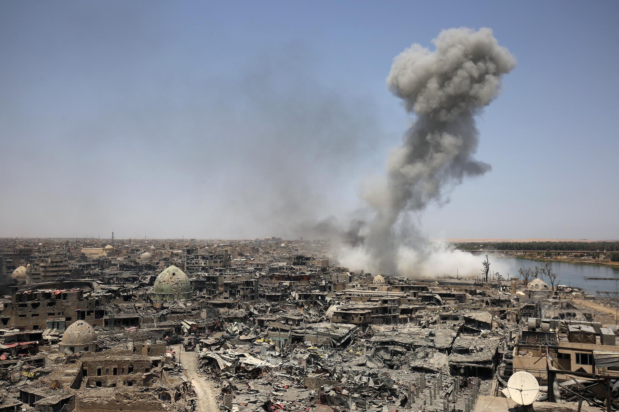 An airstrike by US-led international coalition forces targeting Isis in Mosul (AFP/Getty)