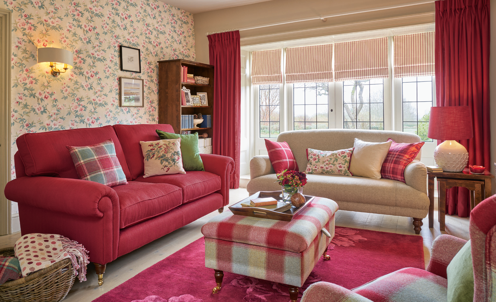 Kingston two-seater sofa (red), from £1,225; Tarran upholstered two-seater sofa (beige), from £1,295