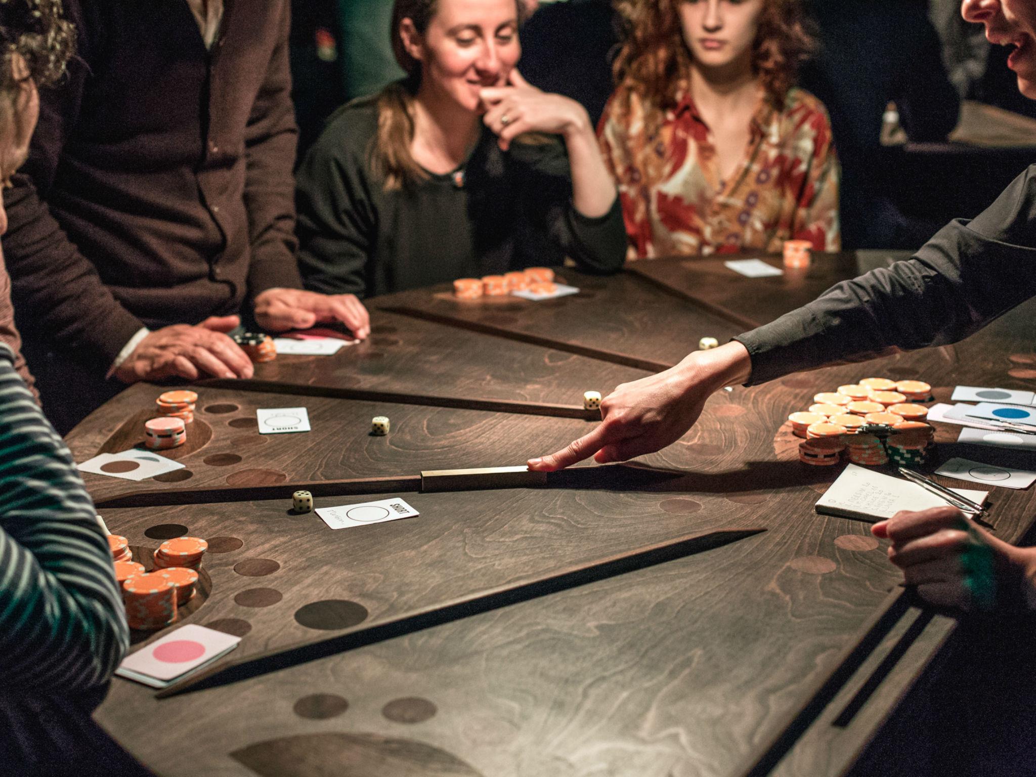 Ontroerend Goed's gaming show '£¥€$ (Lies)' sits its audience at gambling tables and turns the stockmarket into a casino