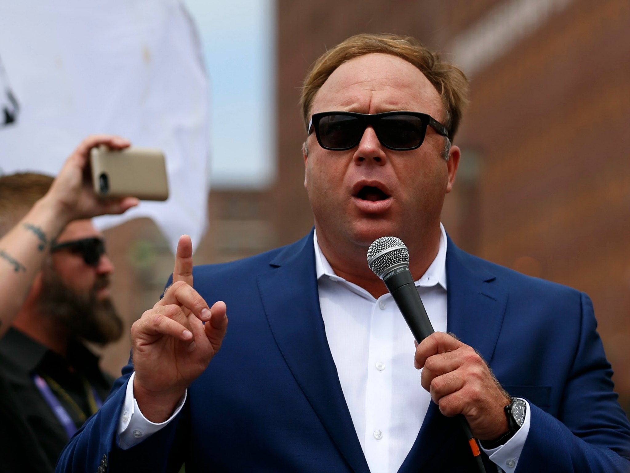 Episodes of Alex Jones' podcast were pulled down following public pressure