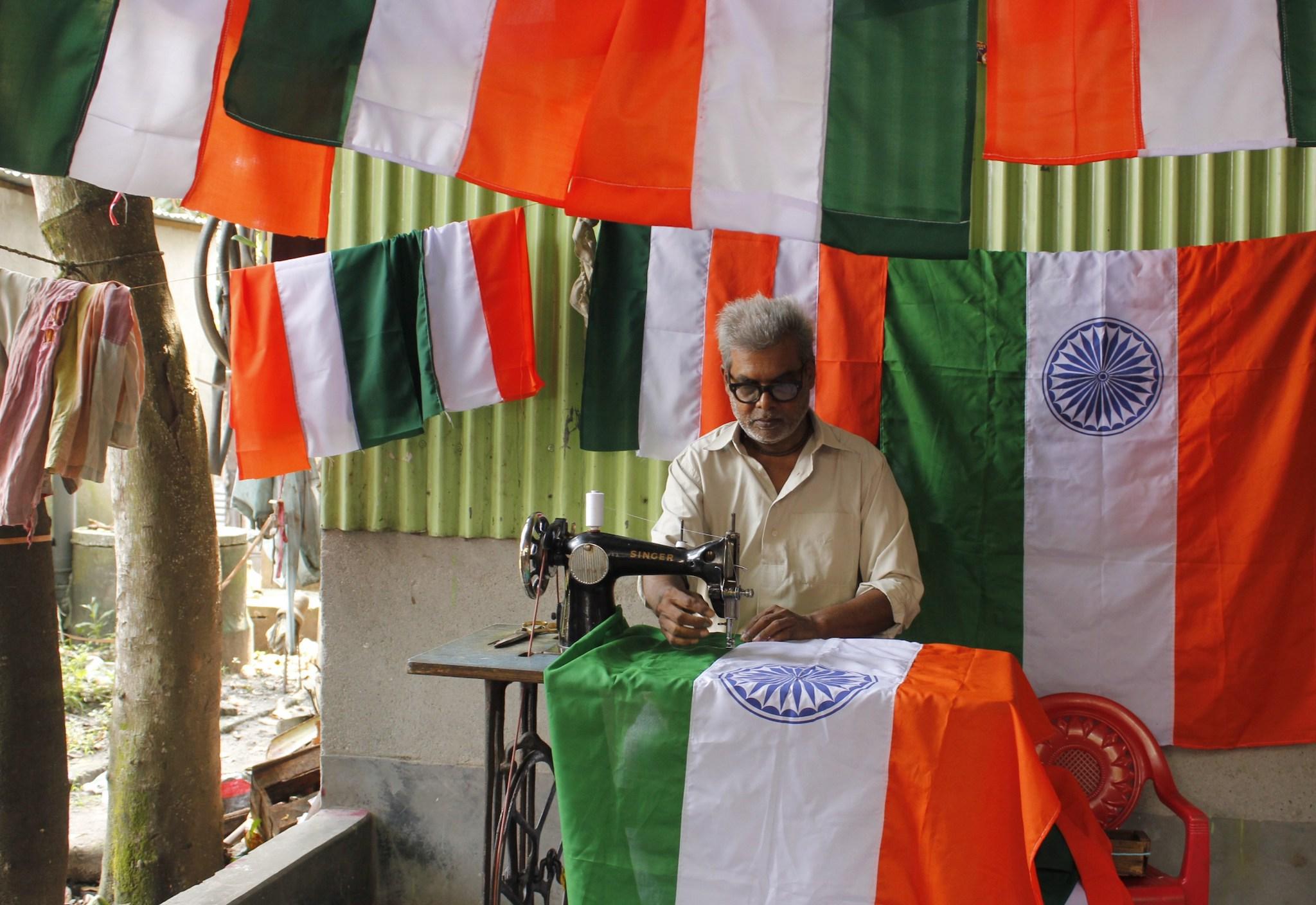 The spinning wheel logo was replaced on the Indian flag by a Buddhist wheel of life