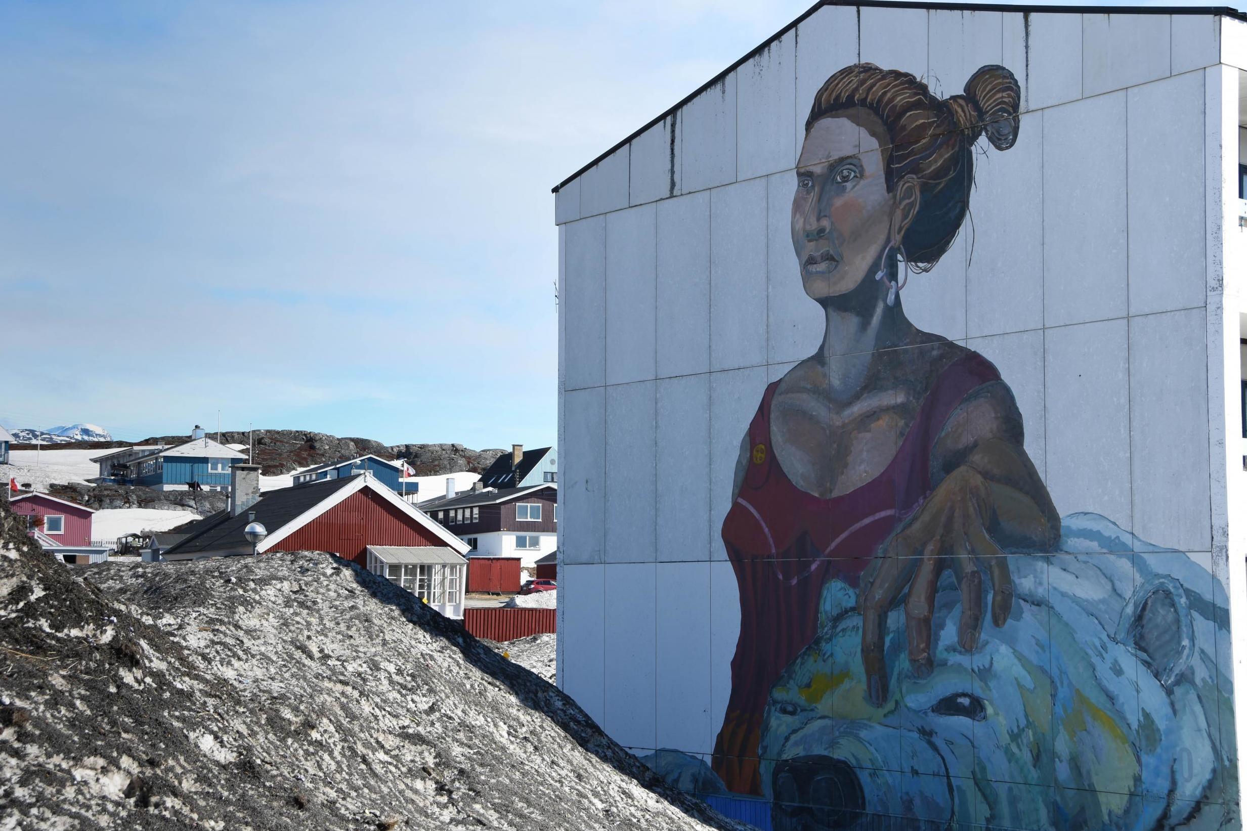 Stefan Baldursson and Guido van Helten created these murals on Nuuk’s apartment blocks