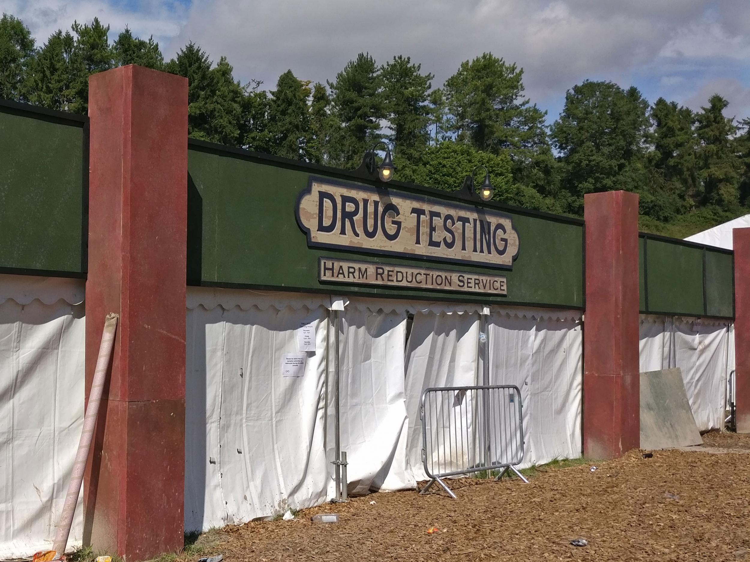 People anonymously drop off a sample of their drugs at the tent and return in a few hours to find out what is really in them