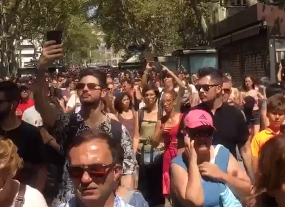 Tourists and locals came together in a show of defiance just a day after the deadly attack