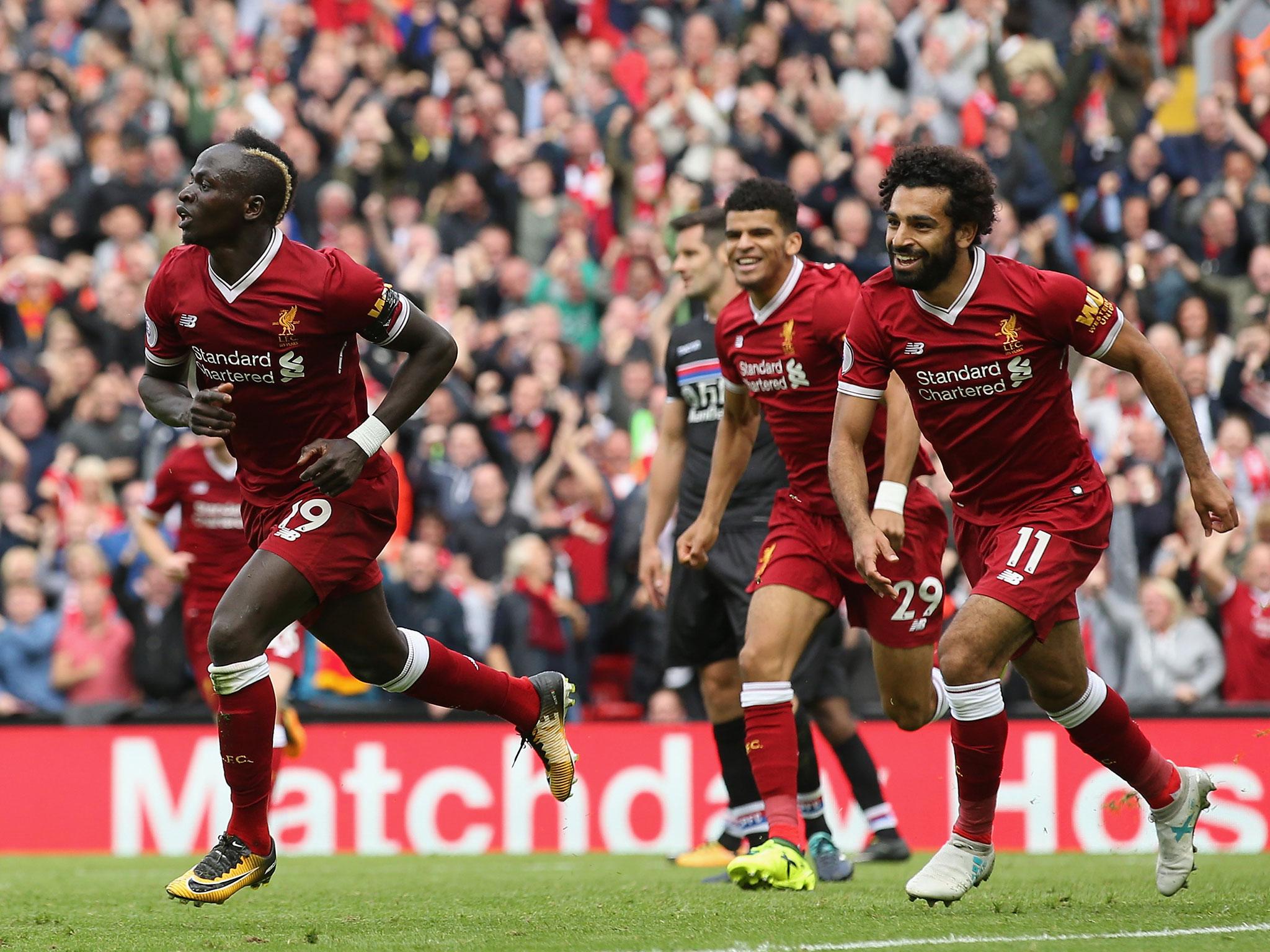 Sadio Mane celebrates breaking the deadlock at Anfield