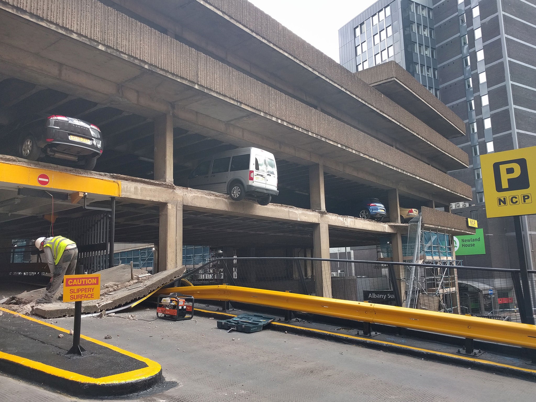 The NCP Nottingham City car park after a wall collapsed leaving vehicles hanging in mid-air