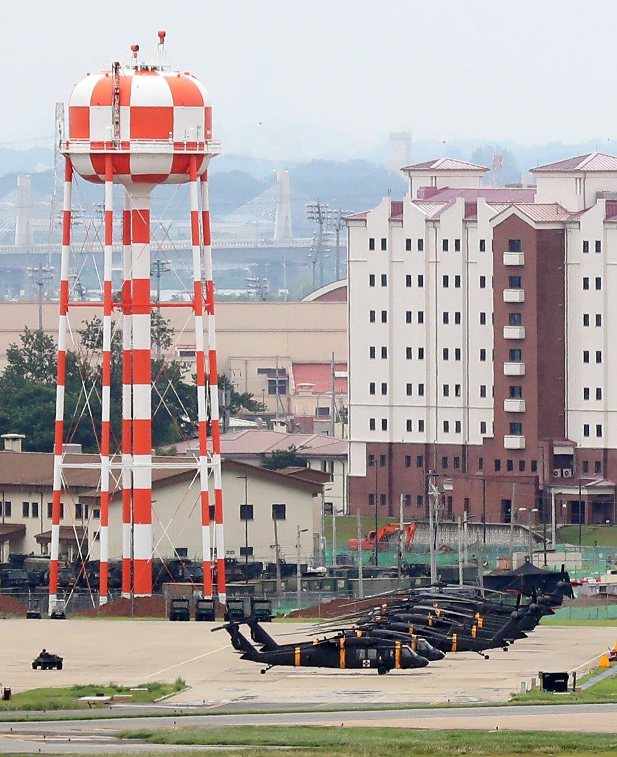 Helicopters are deployed at Camp Humphreys in Pyeongtaek, south of Seoul, on Sunday, a day before South Korea and the US stage an annual joint military exercise