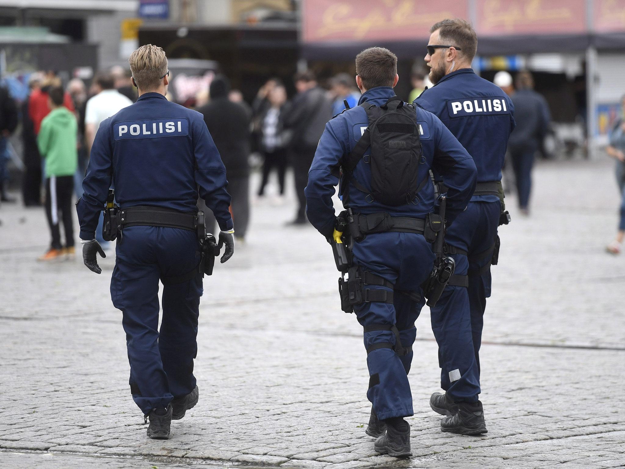 Police patrol the Turku Market Square, Finland