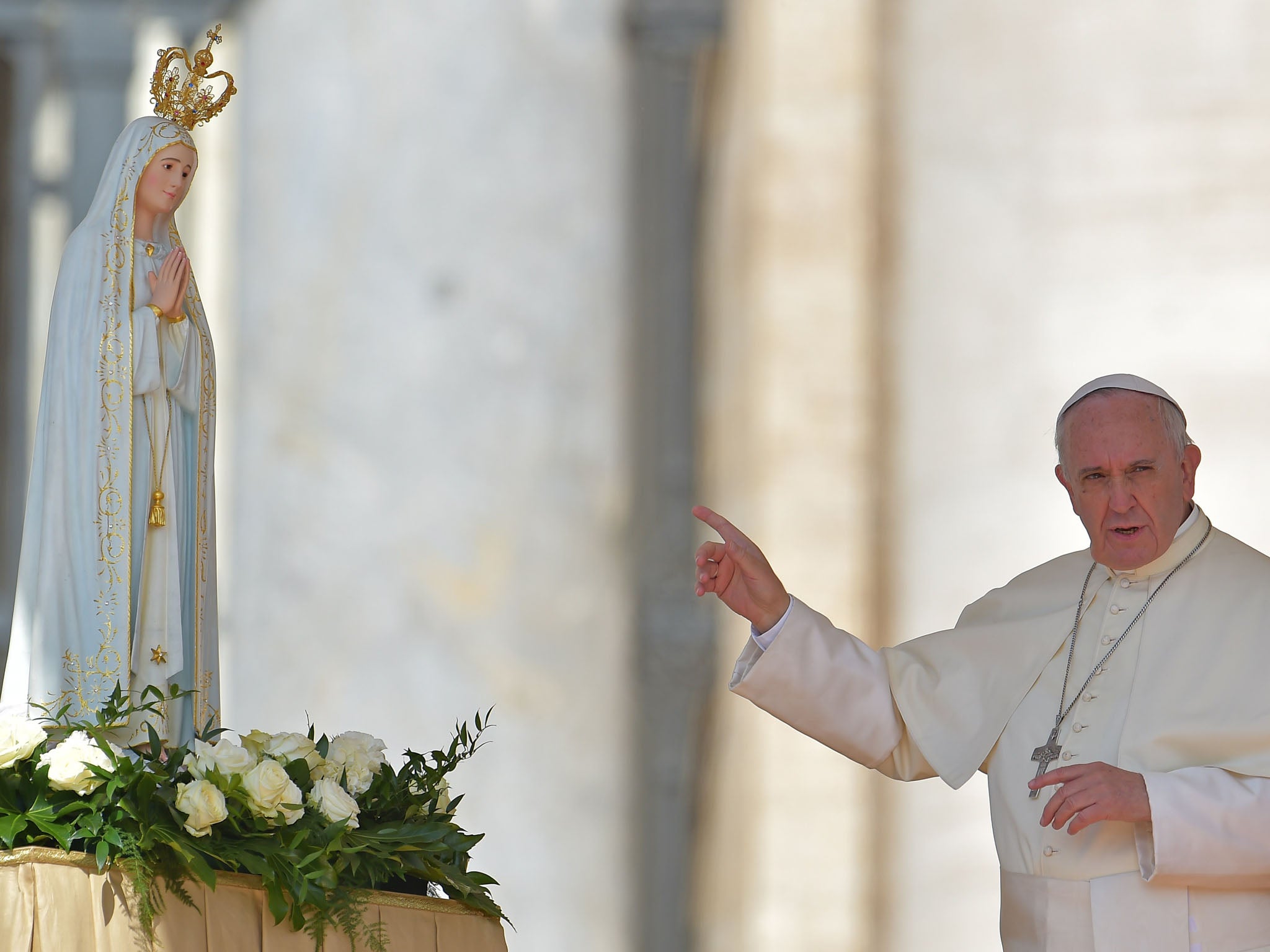 Pope Francis with a figure of Our Lady of Fatima who the group claim predicted the rise of an antipope