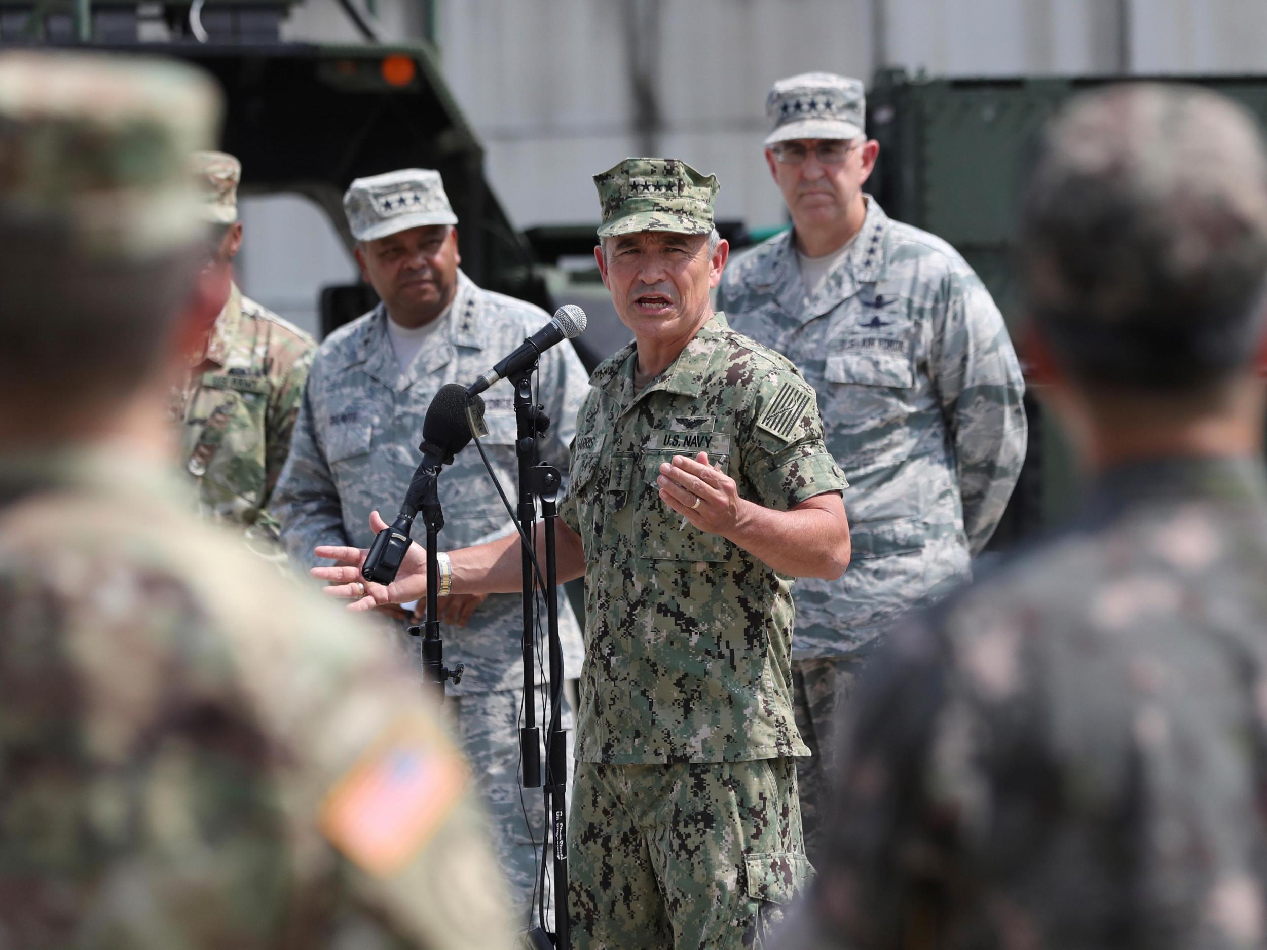 US Pacific Command Commander Admiral Harry Harris Jr answers a reporter's question during a press conference at Osan Air Base in Pyeongtaek in South Korea