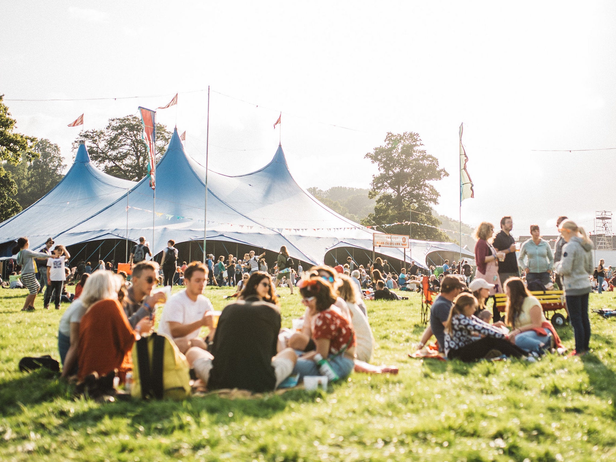 Revellers enjoy the sunshine at Green Man festival 2017 in Wales