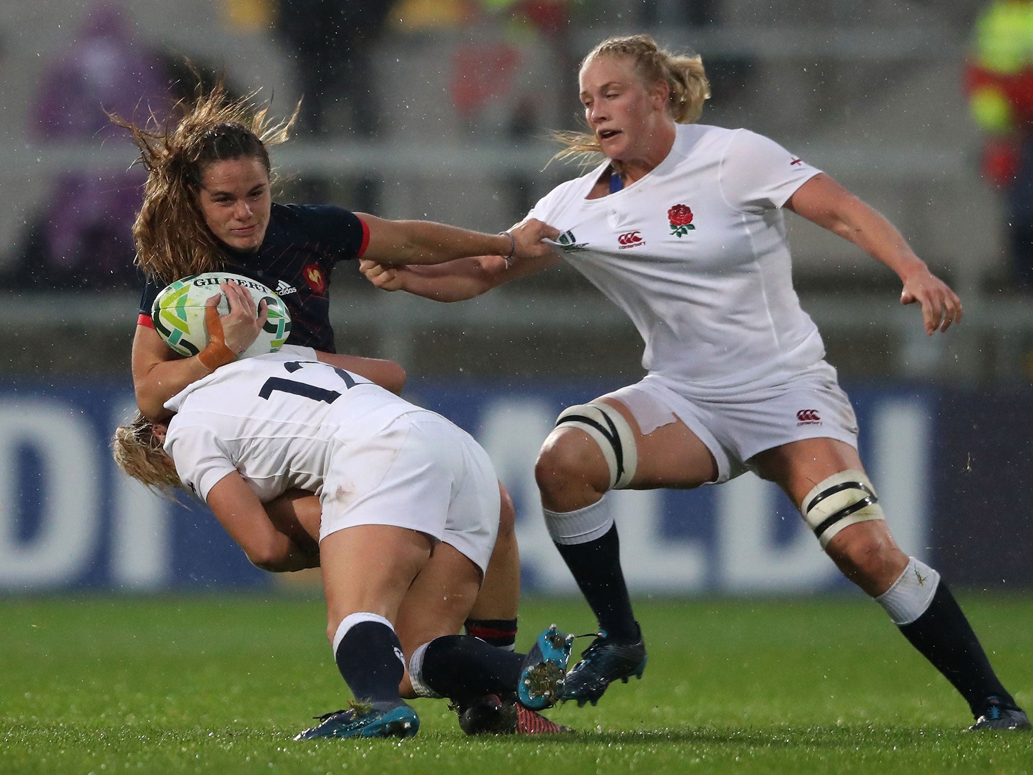 Elodie Poublan of France is tackled by Rachael Burford