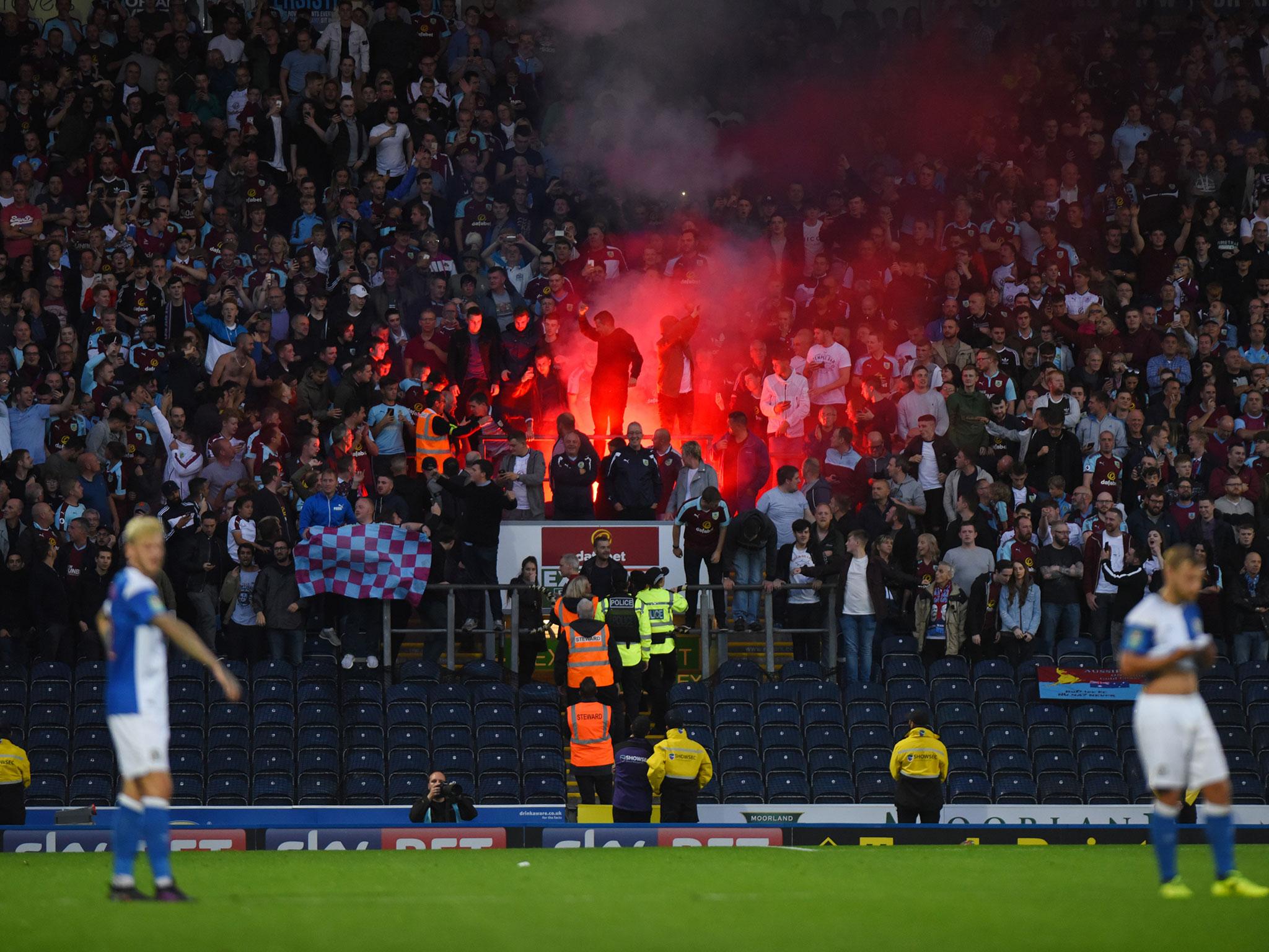 A Burnley fan was ejected for letting off a flare