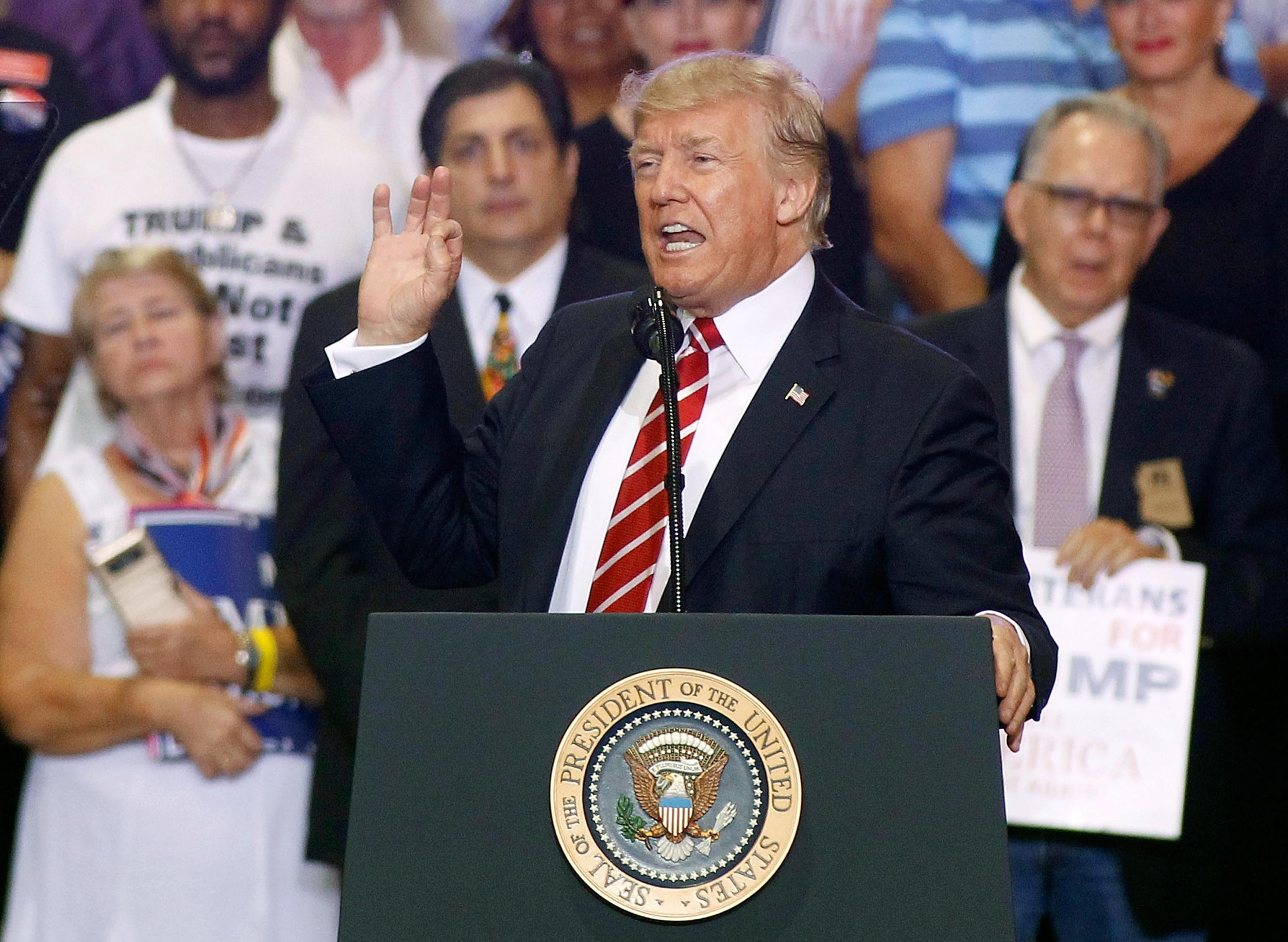 US President Donald Trump speaks to a crowd of supporters at the Phoenix Convention Center during a rally