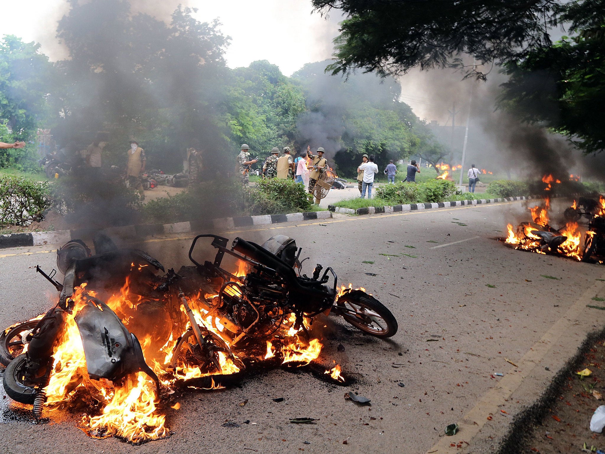 Vehicles set on fire by suspected Dera Sacha Sauda sect members in Panchkula, India