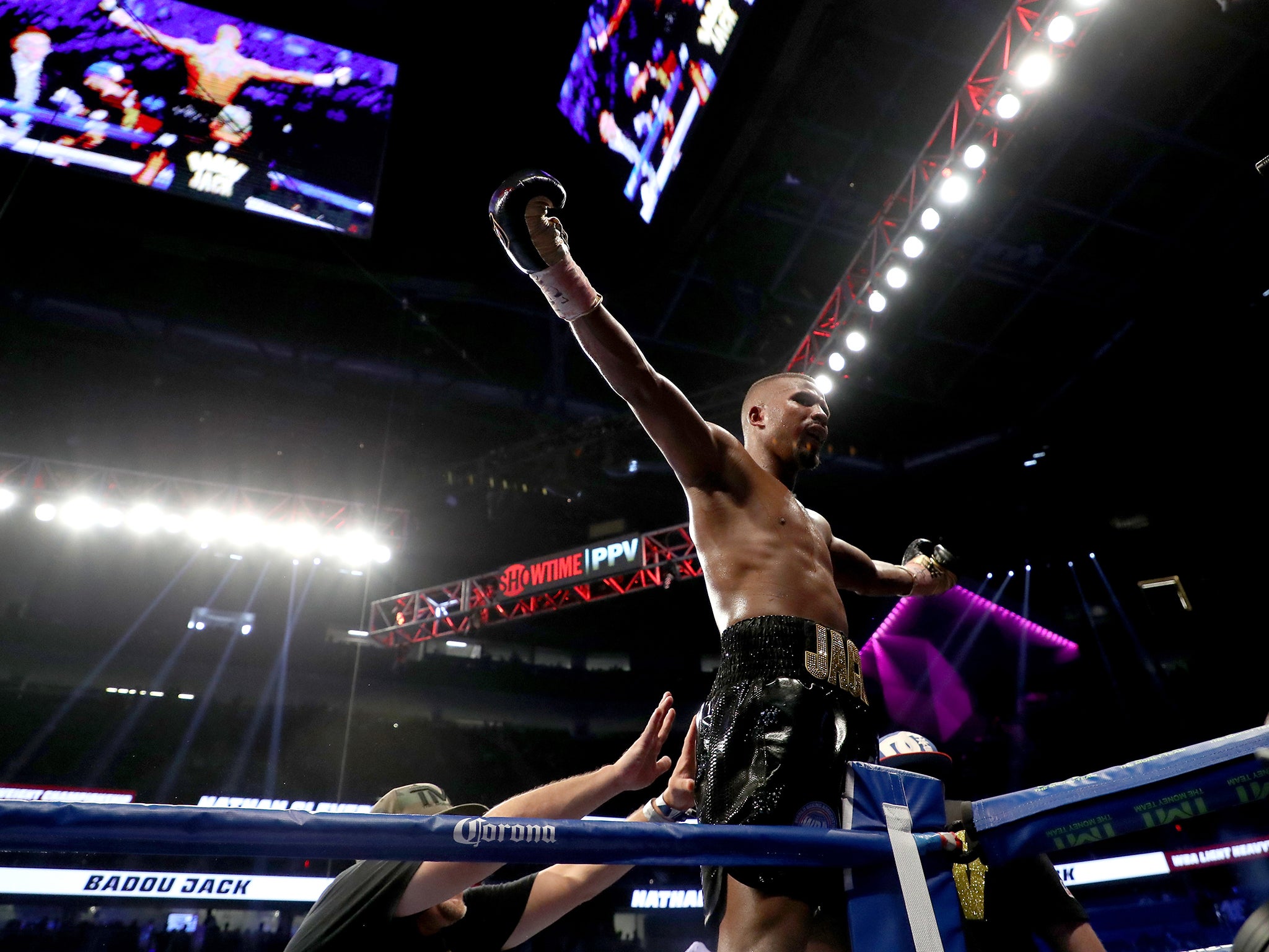 Badou Jack celebrates winning the WBA title after defeating Nathan Cleverly