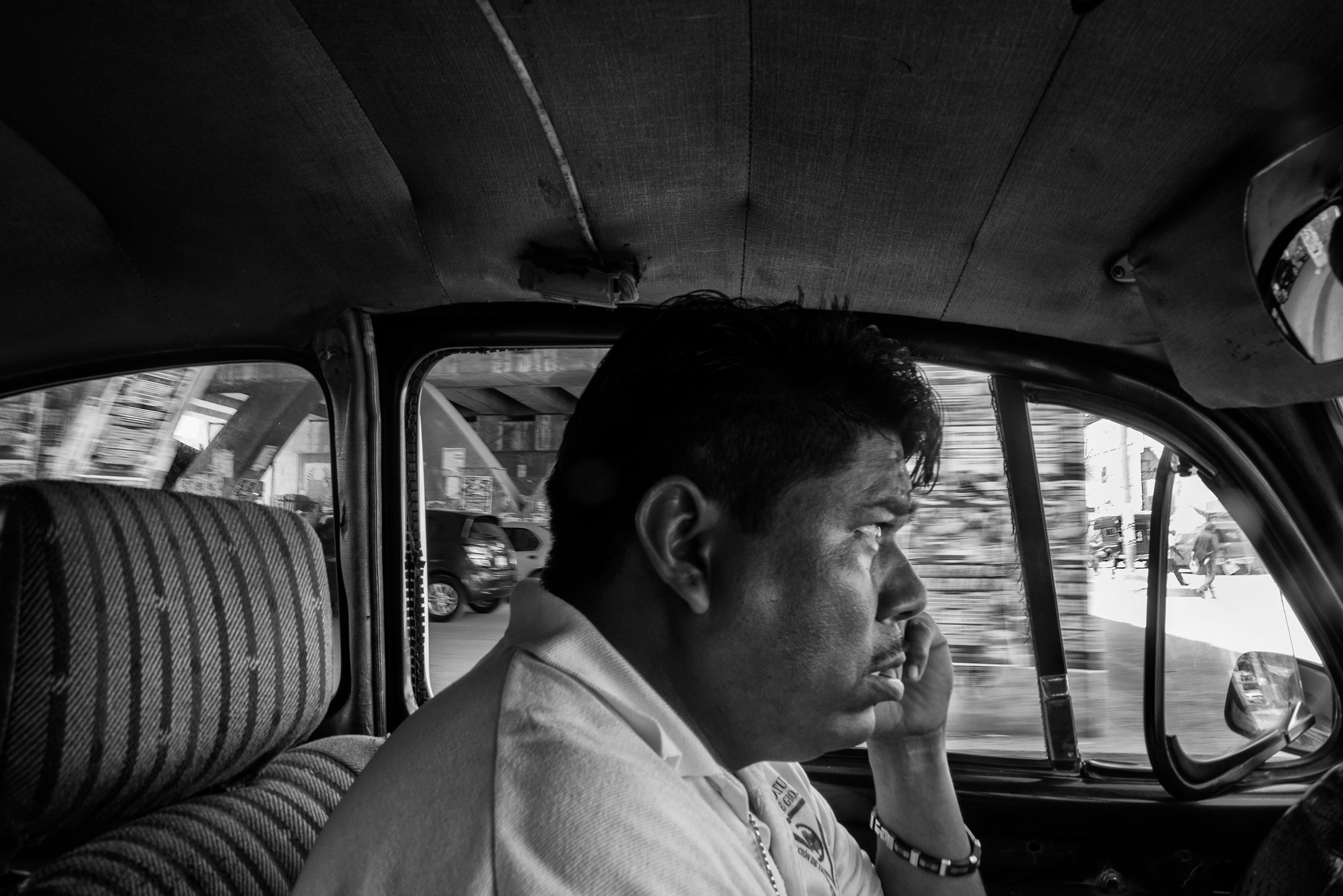 Guillermo Perez drives his taxi in Acapulco. More than 130 cabbies were slain in Acapulco last year, making them about eight times more likely to get murdered than the average city resident