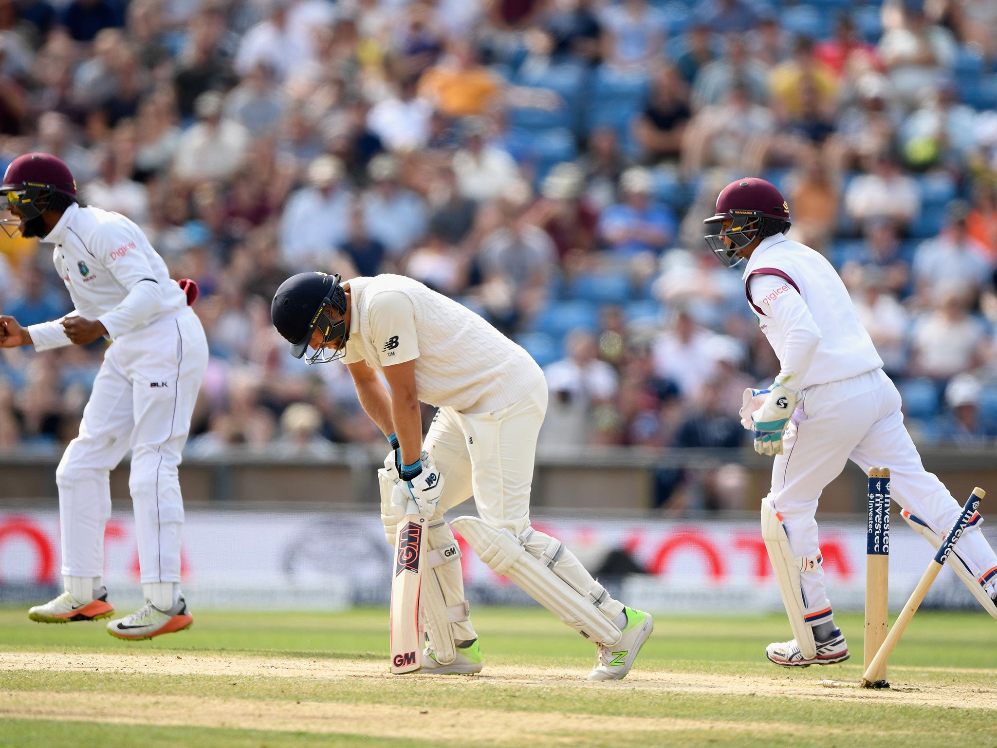 Dawid Malan is bowled by Roston Chase