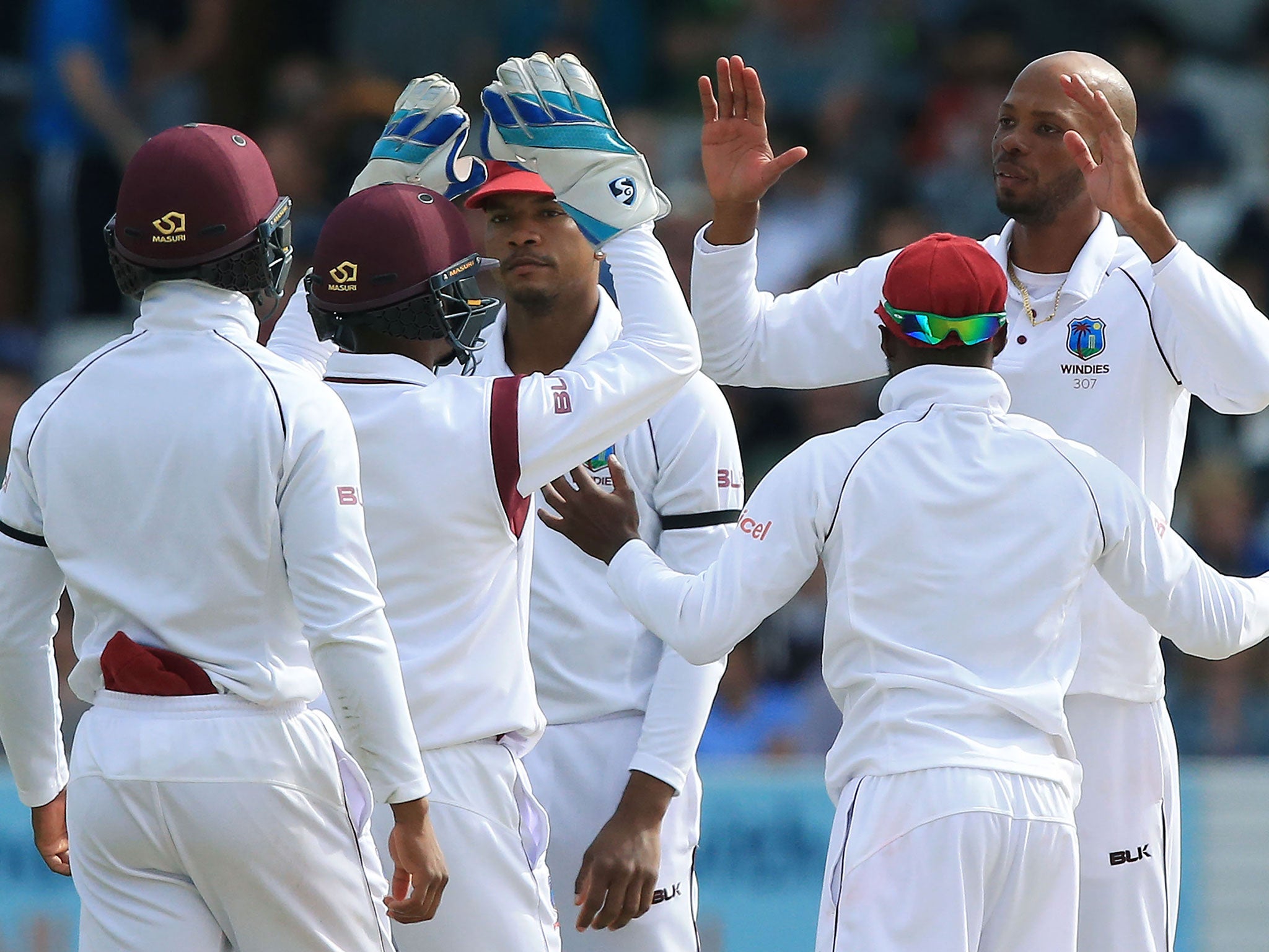 Roston Chase celebrates the wicket of Jonny Bairstow