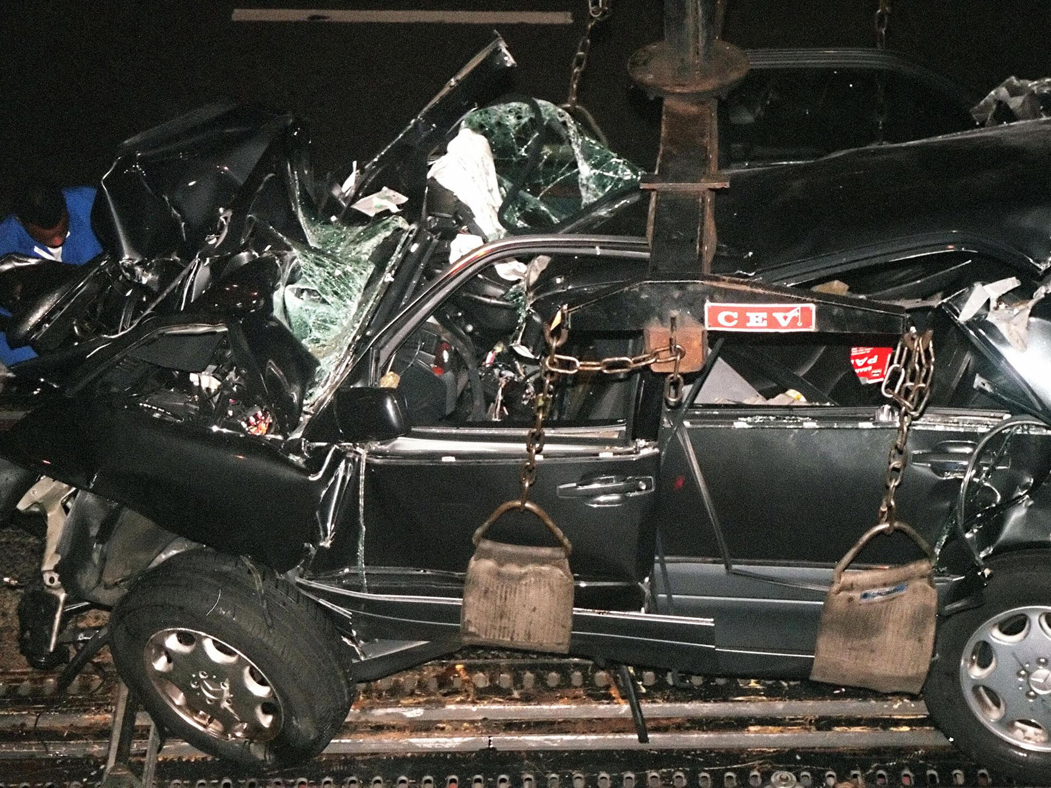 Princess Diana's car is removed from the Alma tunnel​ AFP/Getty)