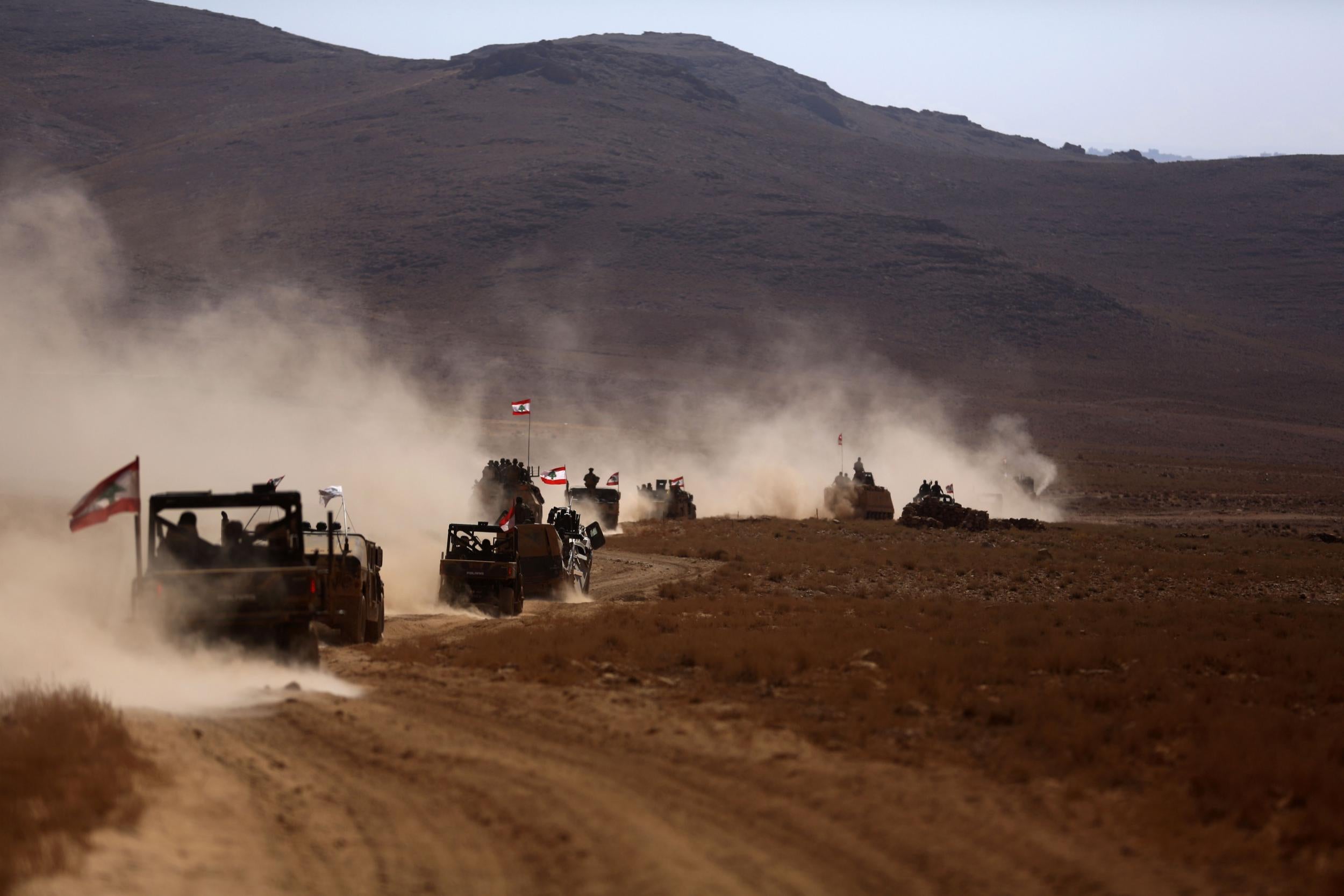 Lebanese army soldiers patrol the Syrian border in an area they recently took from Isis in Jurud Ras Baalbek on 28 August 2017