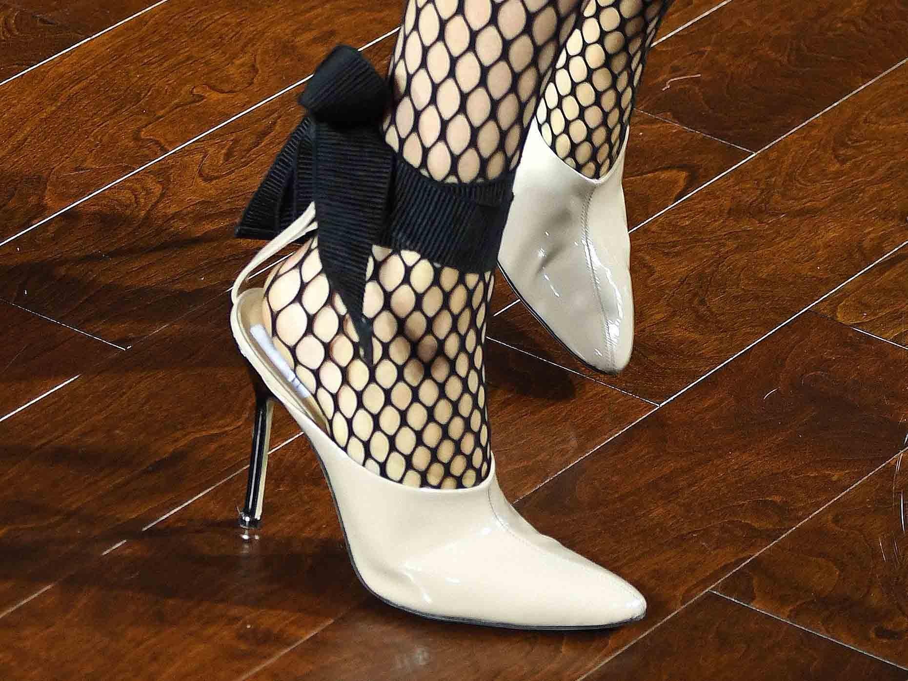 Jason Wu paired full-length tights and ankle styles with two-piece suits, floaty midi dresses and ruffled skirts