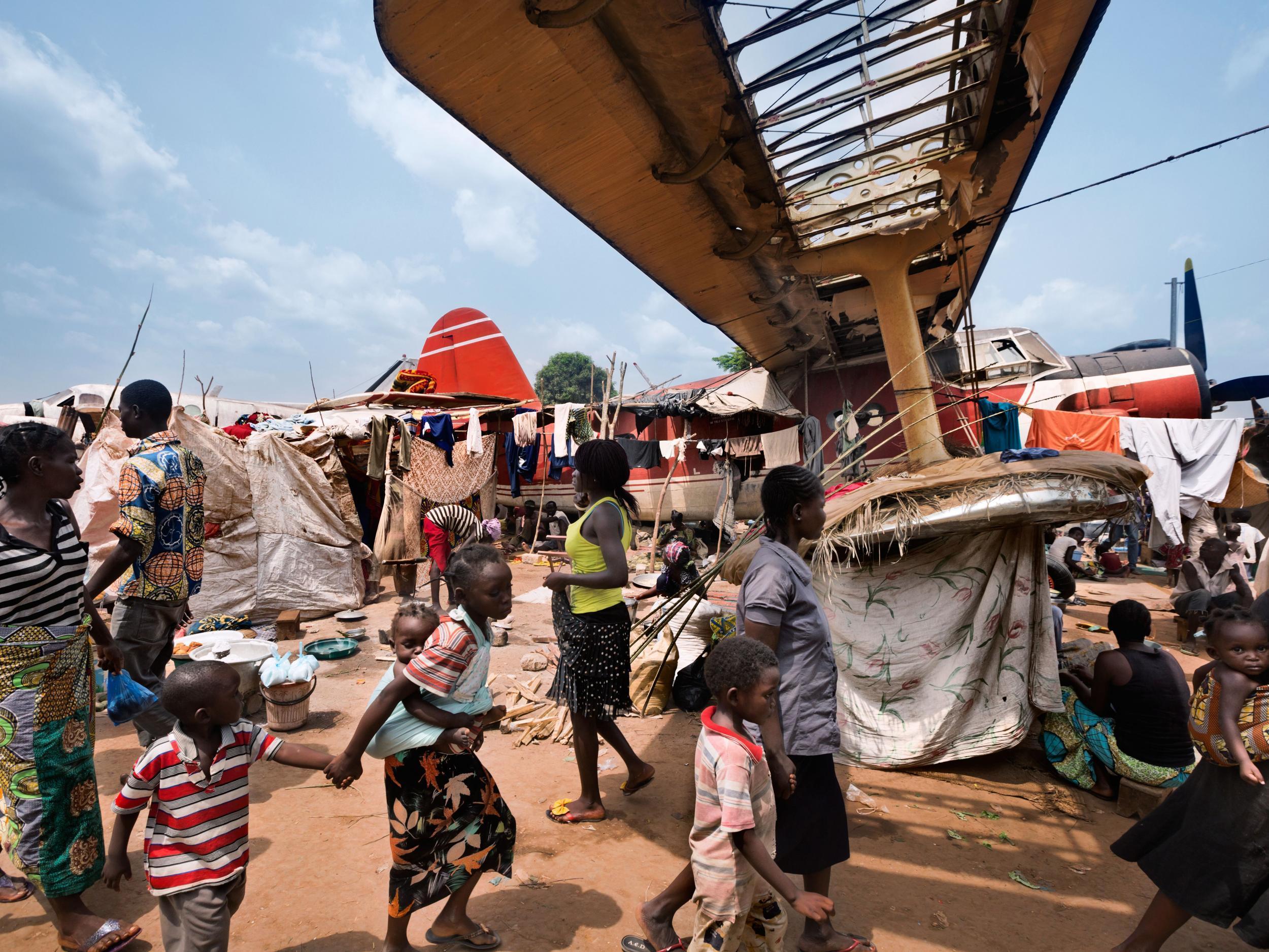 The grounded plane is barely noticeable in this shot from Bangui in the Central African Republic