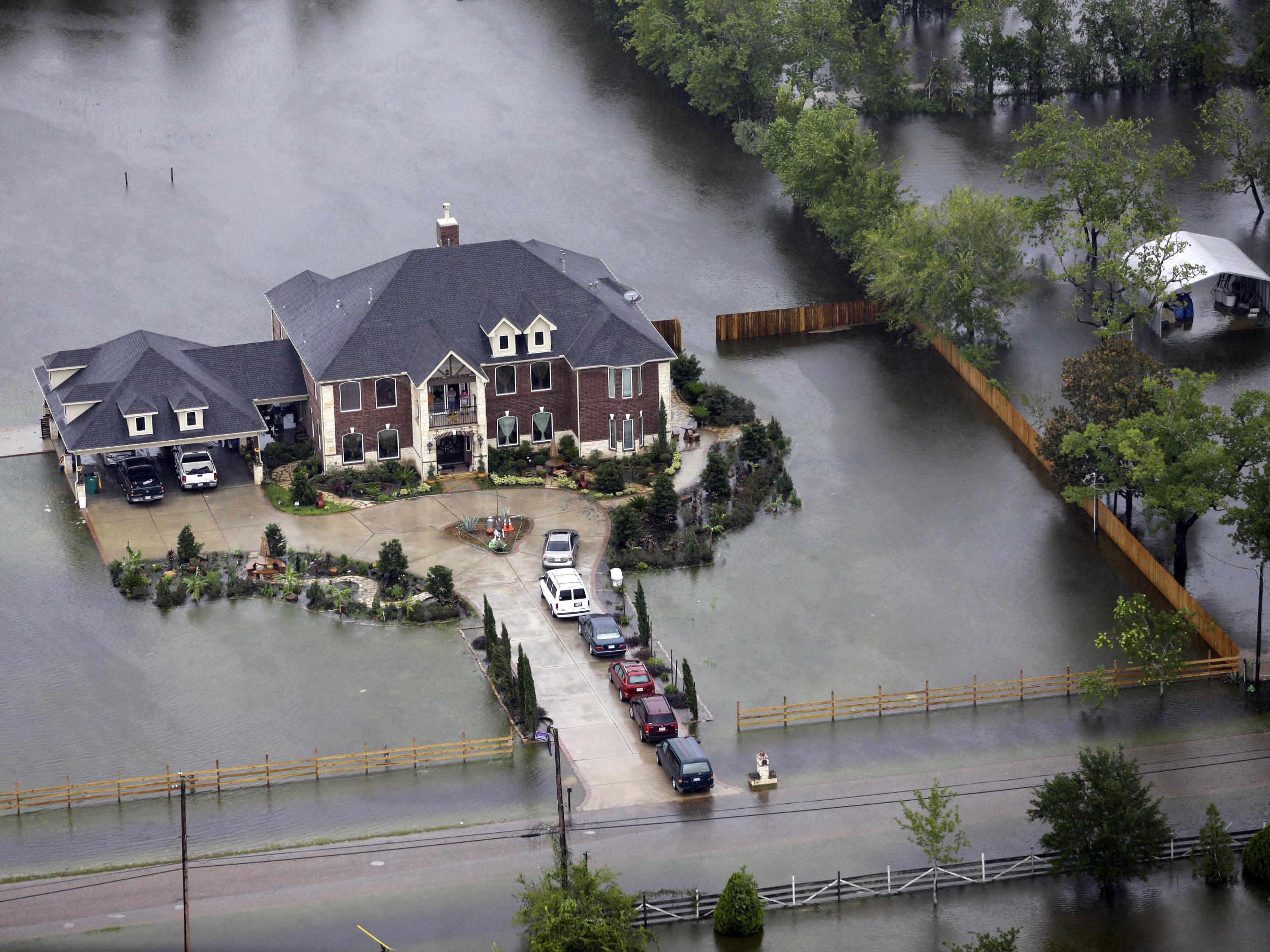 A home surrounded by floodwaters