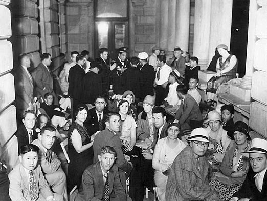 Outside the courtroom, the public waits to enter the court to hear the infamous case