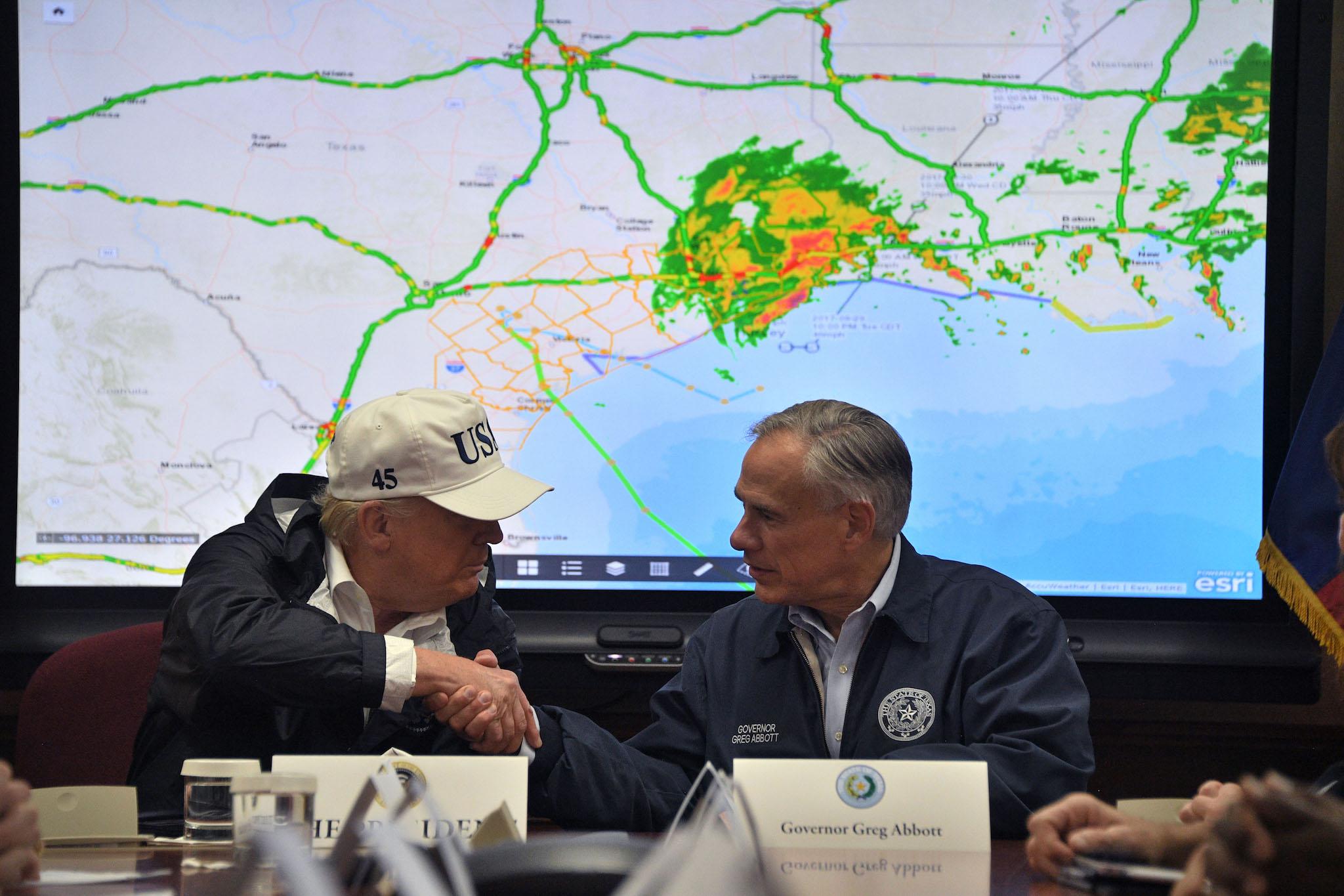 Donald Trump shakes hands with Texas Governor Greg Abbott