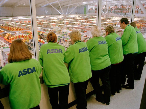 Staff at Asda: Some learned of its plans to merge with Sainsbury's from customers