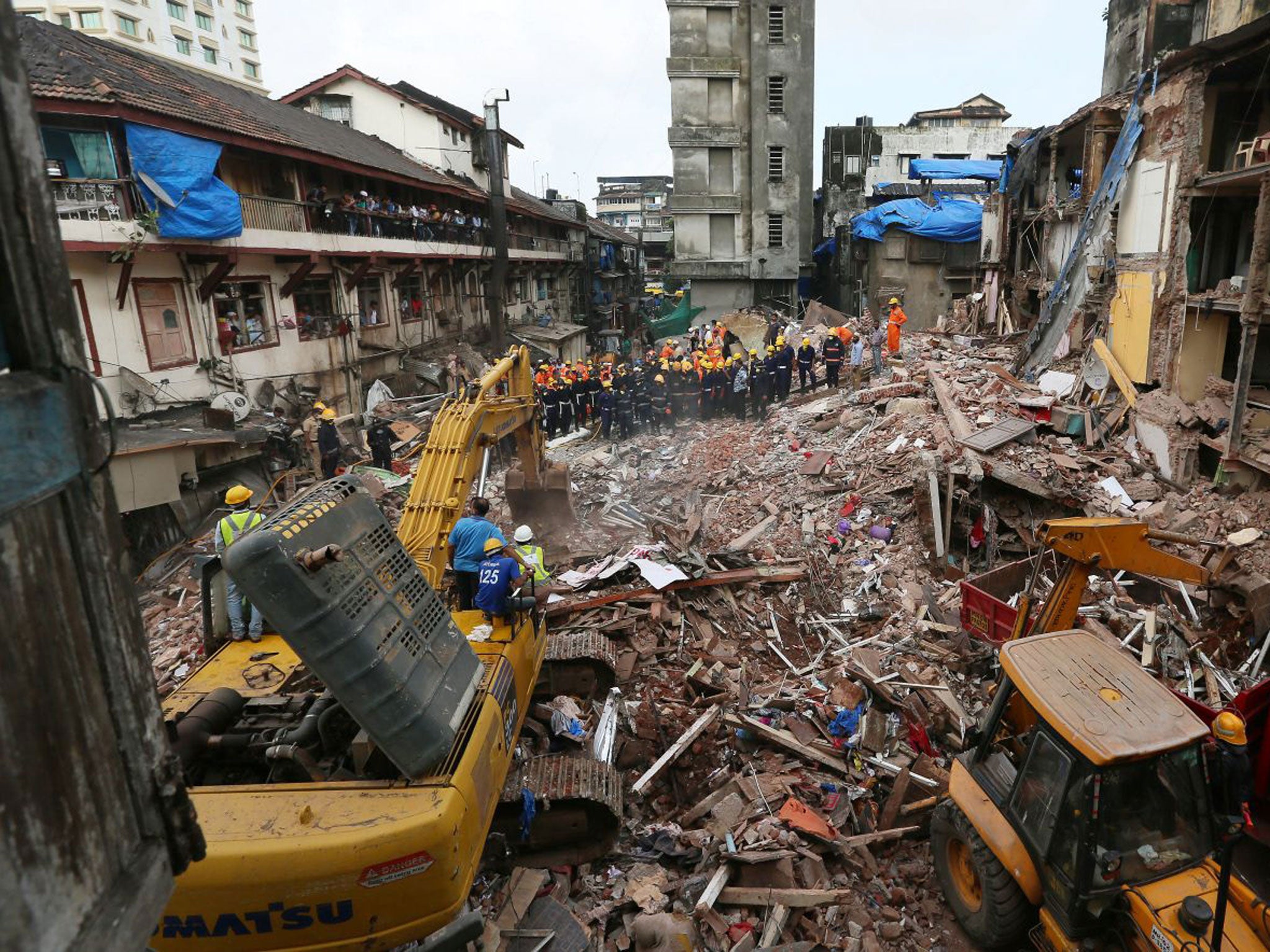 Workers pulled 15 people to safety from the crumpled debris