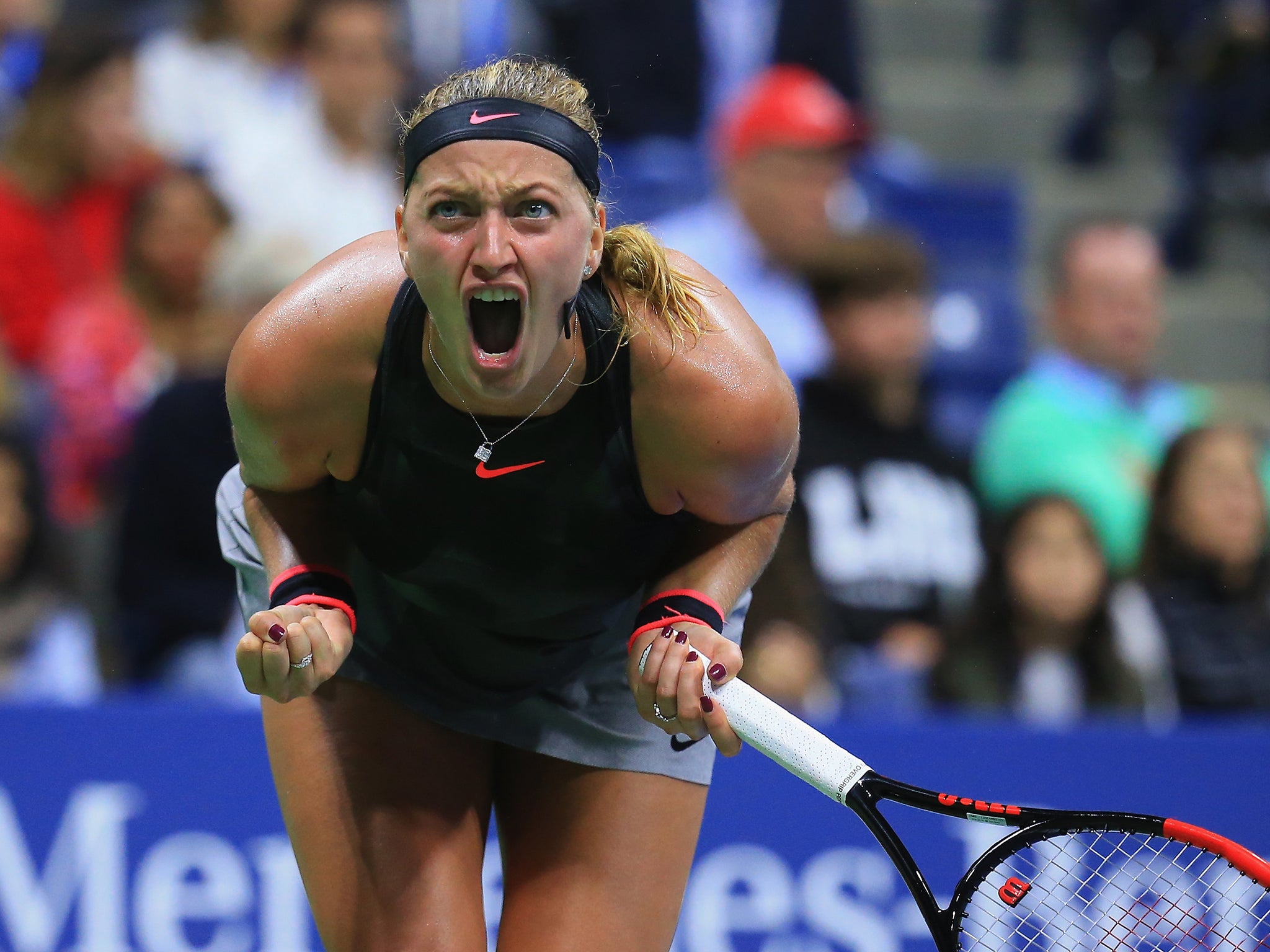 Kvitova roars with delight after winning the first set