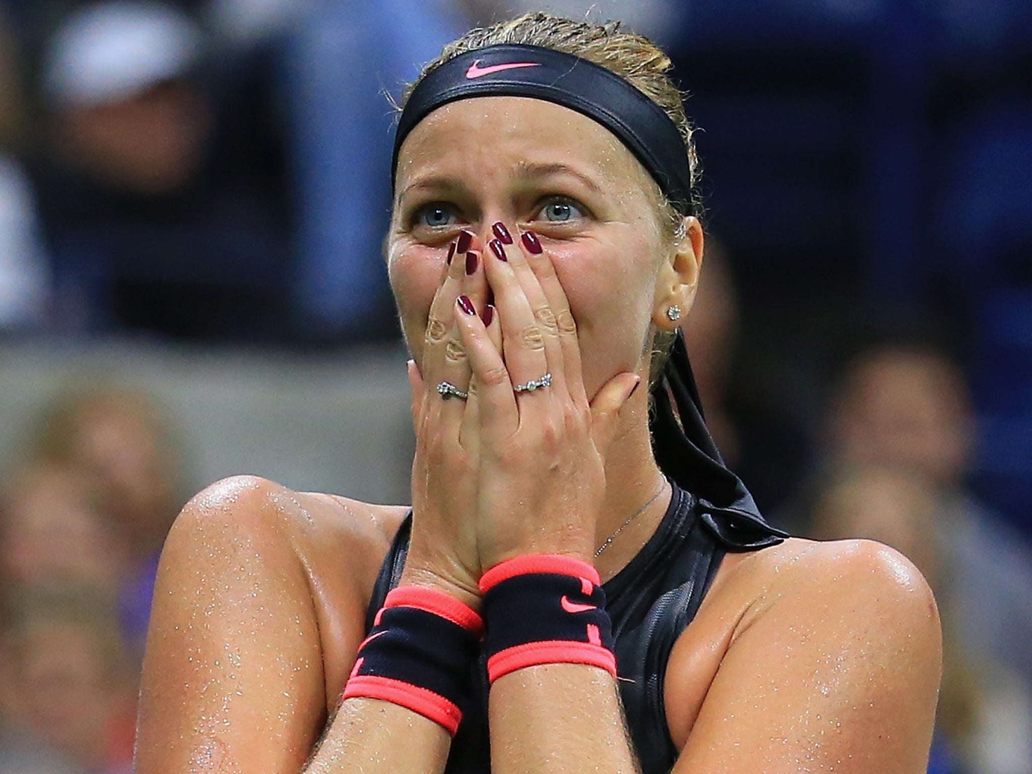 Petra Kvitova celebrates her victory over Garbine Muguruza in the US Open fourth round