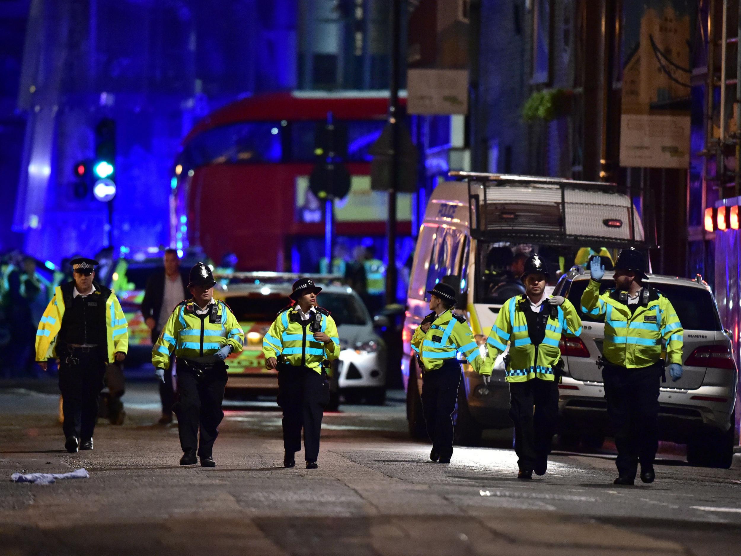 Police officers on Borough High Street in London after a terror attack in June